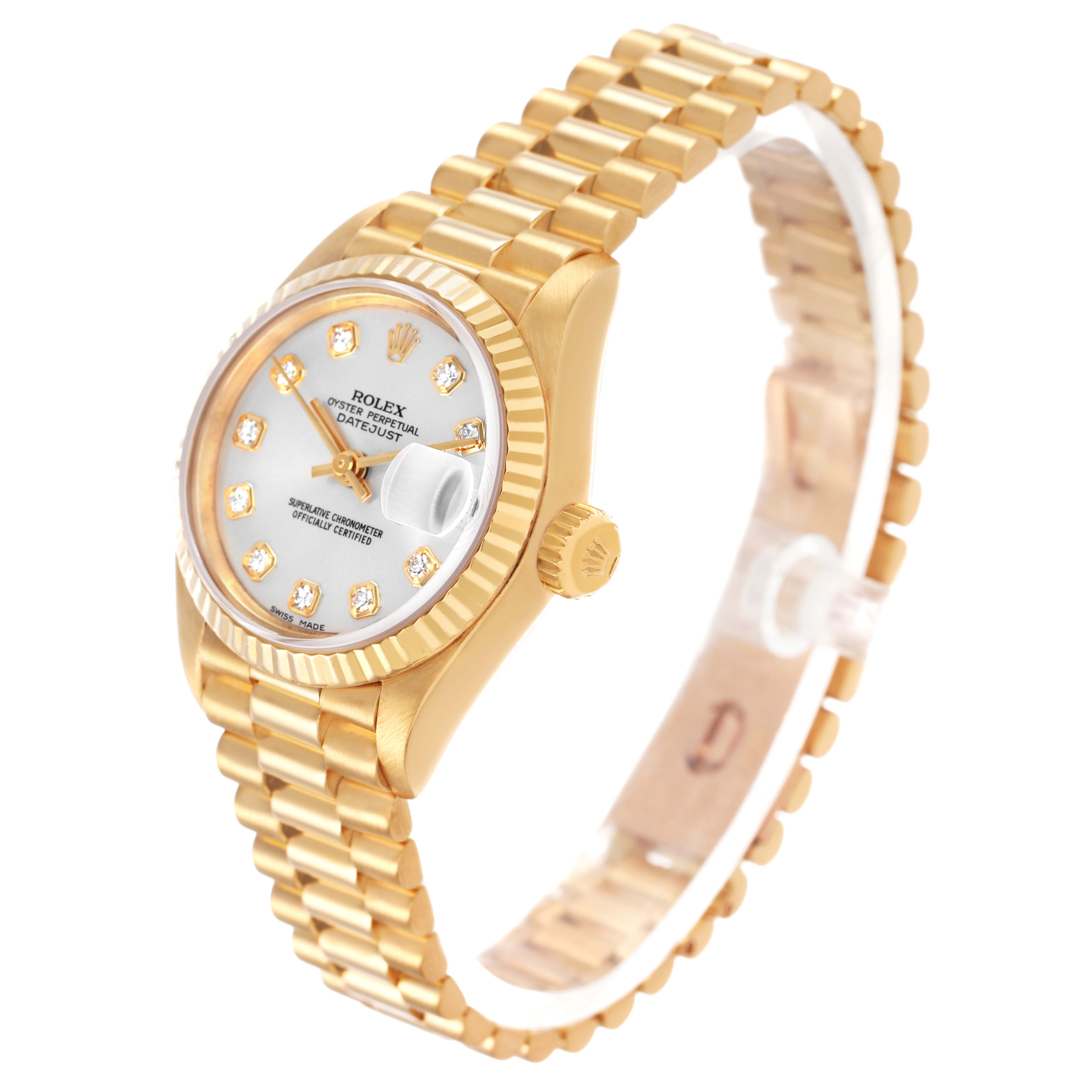 The Rolex President 69178 Women's Yellow Gold Silver Dial watch is shown at a side angle, highlighting its gold case, fluted bezel, and bracelet.