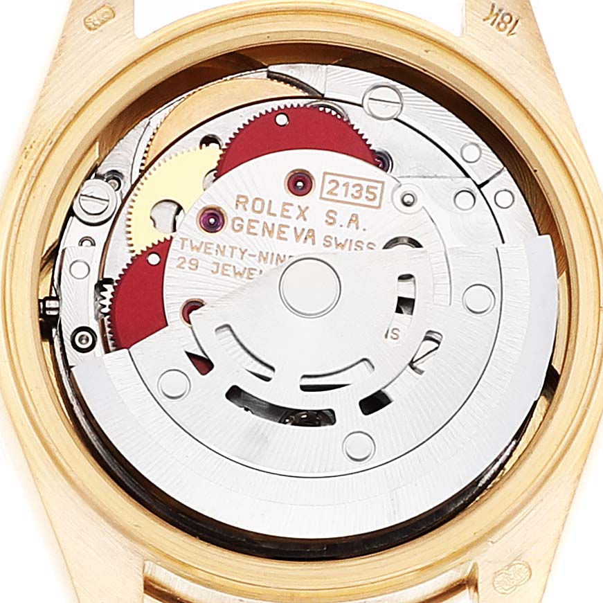 The image shows the back view of the Rolex President 69078 Women's Yellow Gold Champagne Dial 69078 Women's Yellow Gold Champagne Dial model, highlighting its intricate internal mechanism.