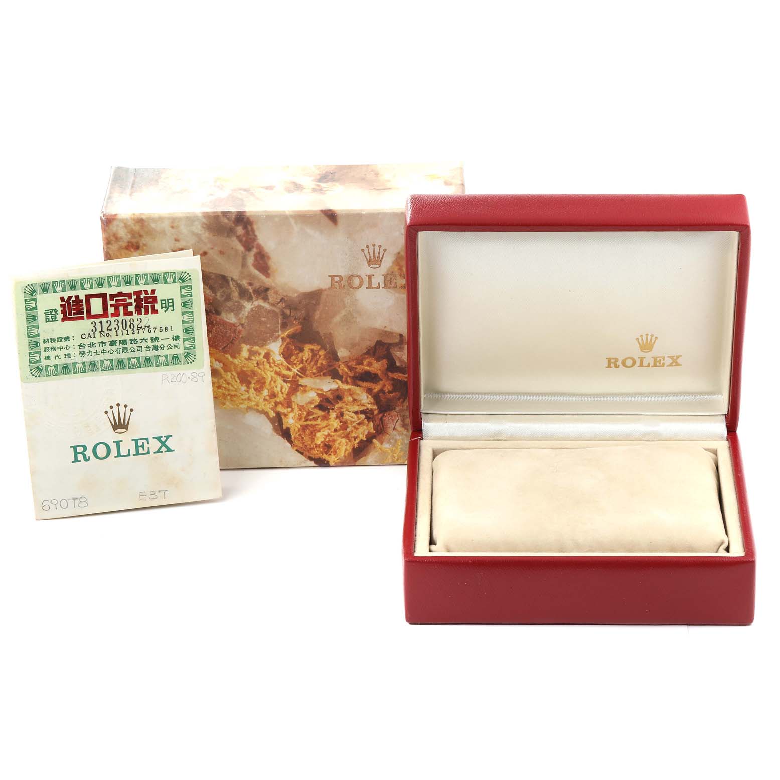 The image shows the box and packaging of a Rolex President 69078 Women's Yellow Gold Champagne Dial 69078 Women's Yellow Gold Champagne Dial model, including its outer box, inner case, and booklet.
