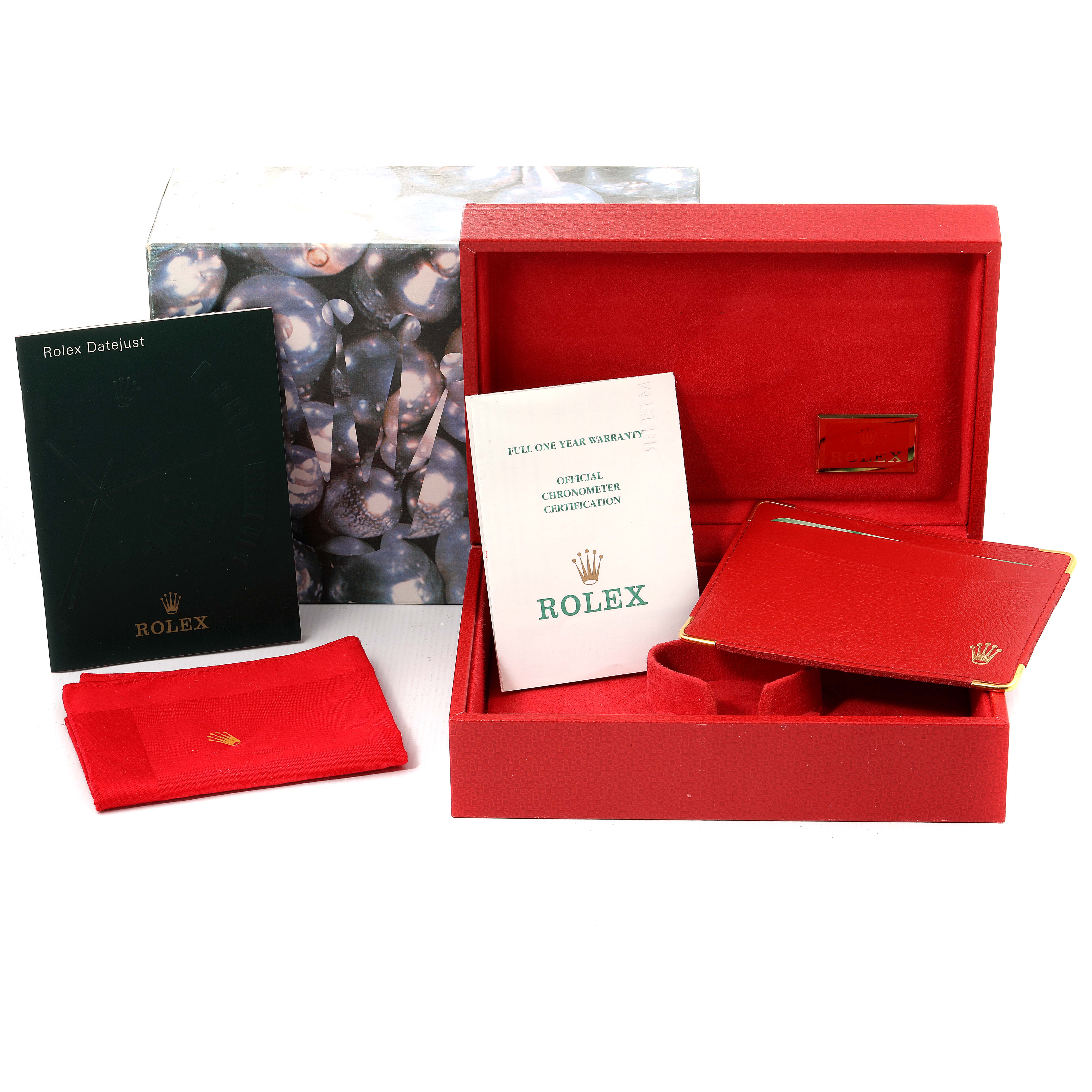 The image shows the packaging and accessories for the Rolex President 79178 Women's Yellow Gold Black Dial 79178 Women's Yellow Gold Black Dial model, including the box, manuals, and warranty cards.