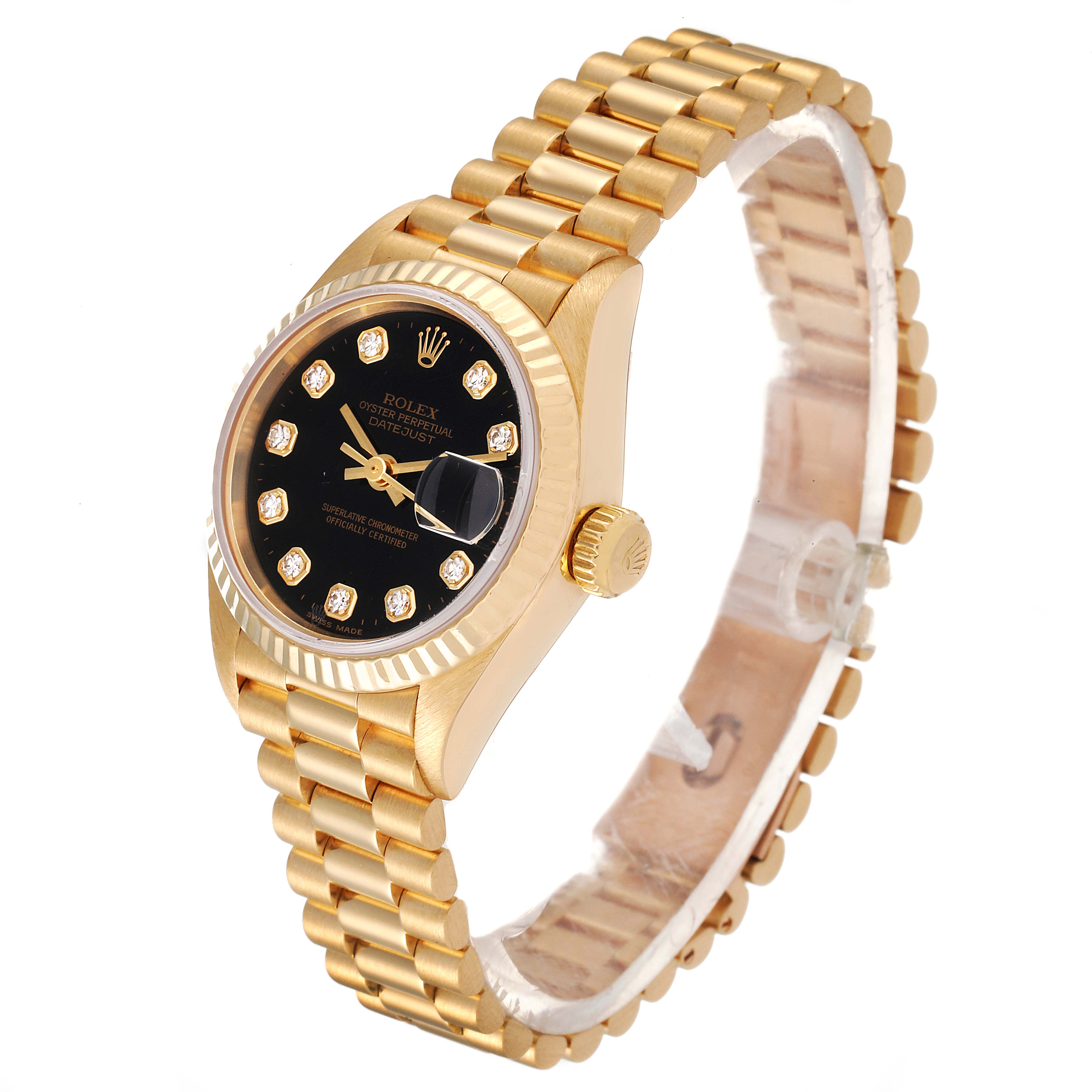 The Rolex President 79178 Women's Yellow Gold Black Dial 79178 Women's Yellow Gold Black Dial model watch is shown at an oblique angle, highlighting its black dial, fluted bezel, gold bracelet, and date magnifier.