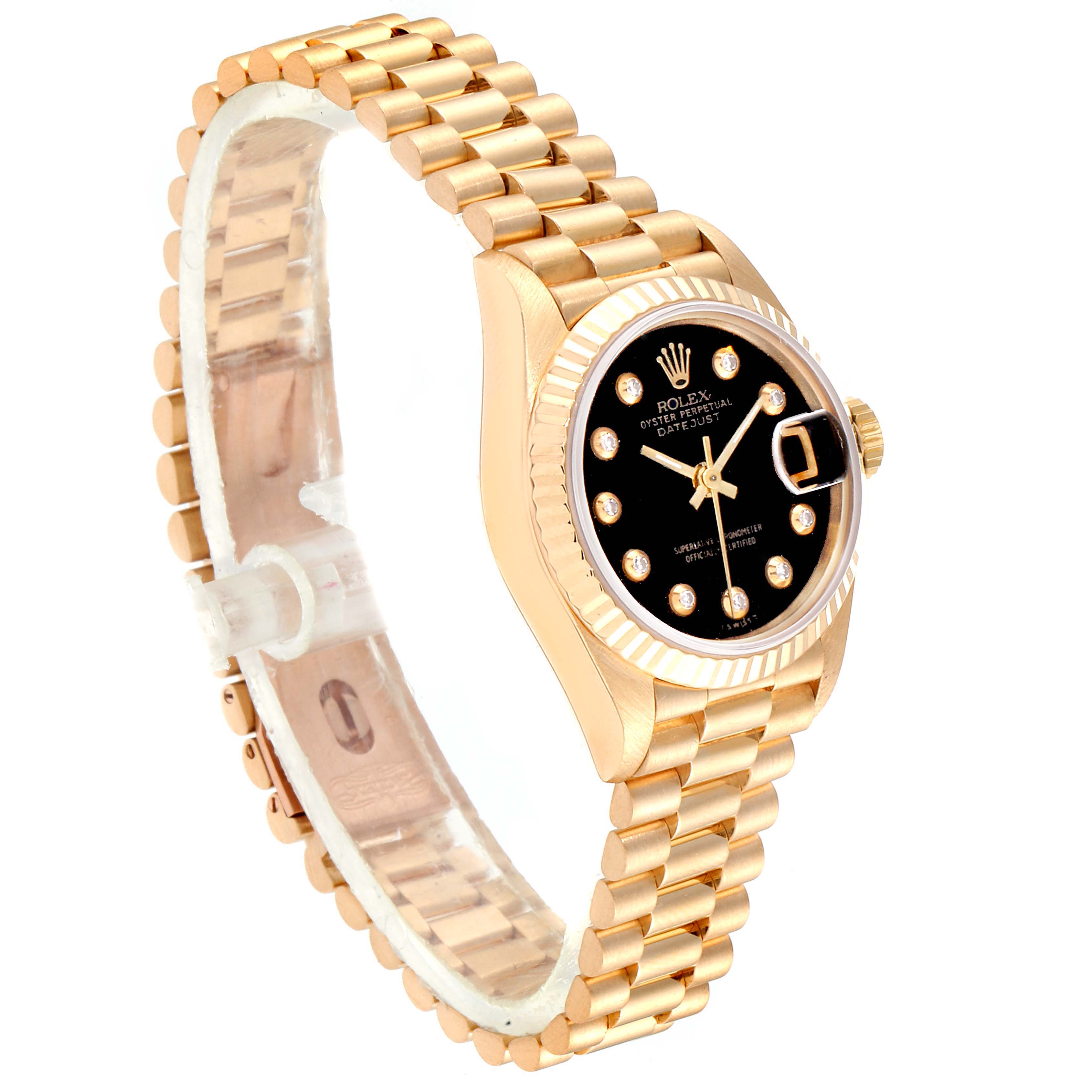 The image shows a Rolex President 69178 Women's Yellow Gold Black Dial 69178 Women's Yellow Gold Black Dial model watch at a side angle, showcasing the bracelet, bezel, crown, and dial with diamond hour markers.