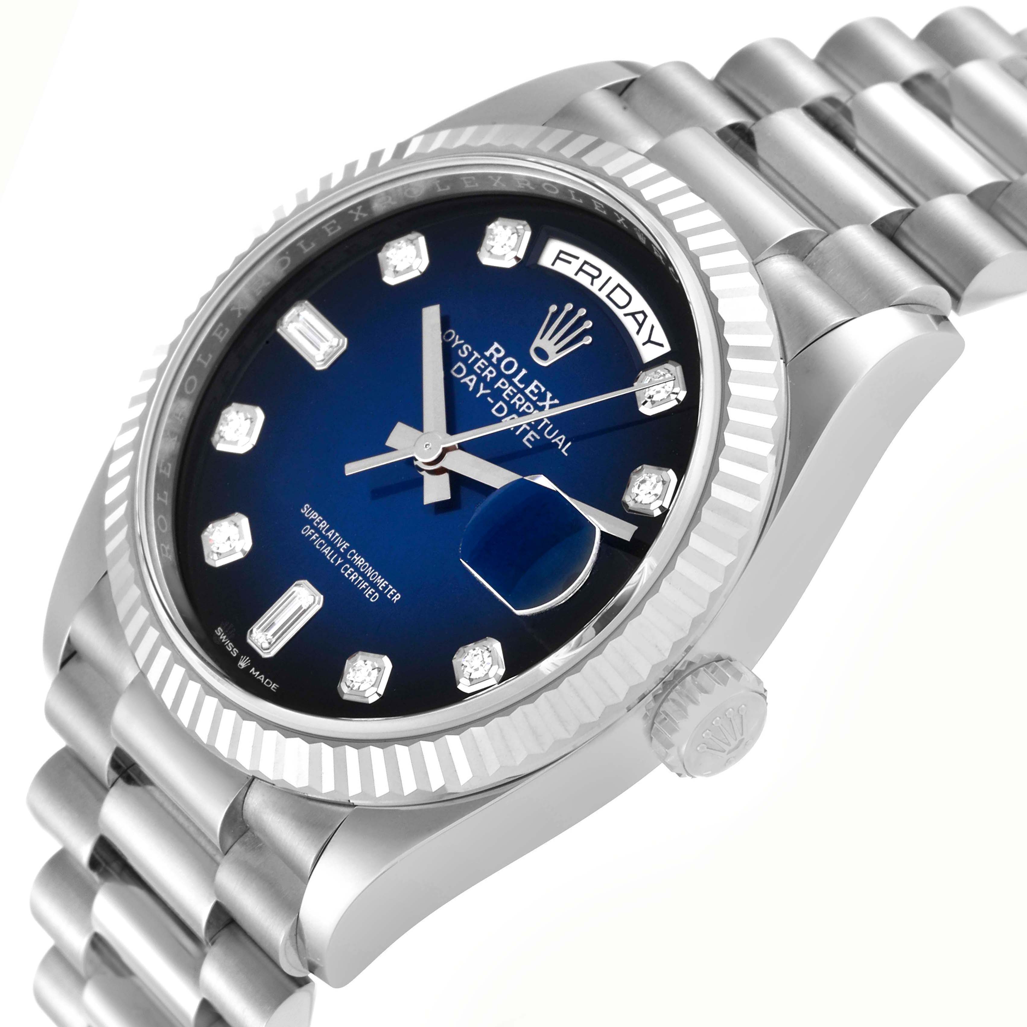 The Rolex President 128239 Men
s White Gold Blue Dial 128239 Men
s White Gold Blue Dial watch is shown at a three-quarter angle featuring its dial, bezel, bracelet, and crown.