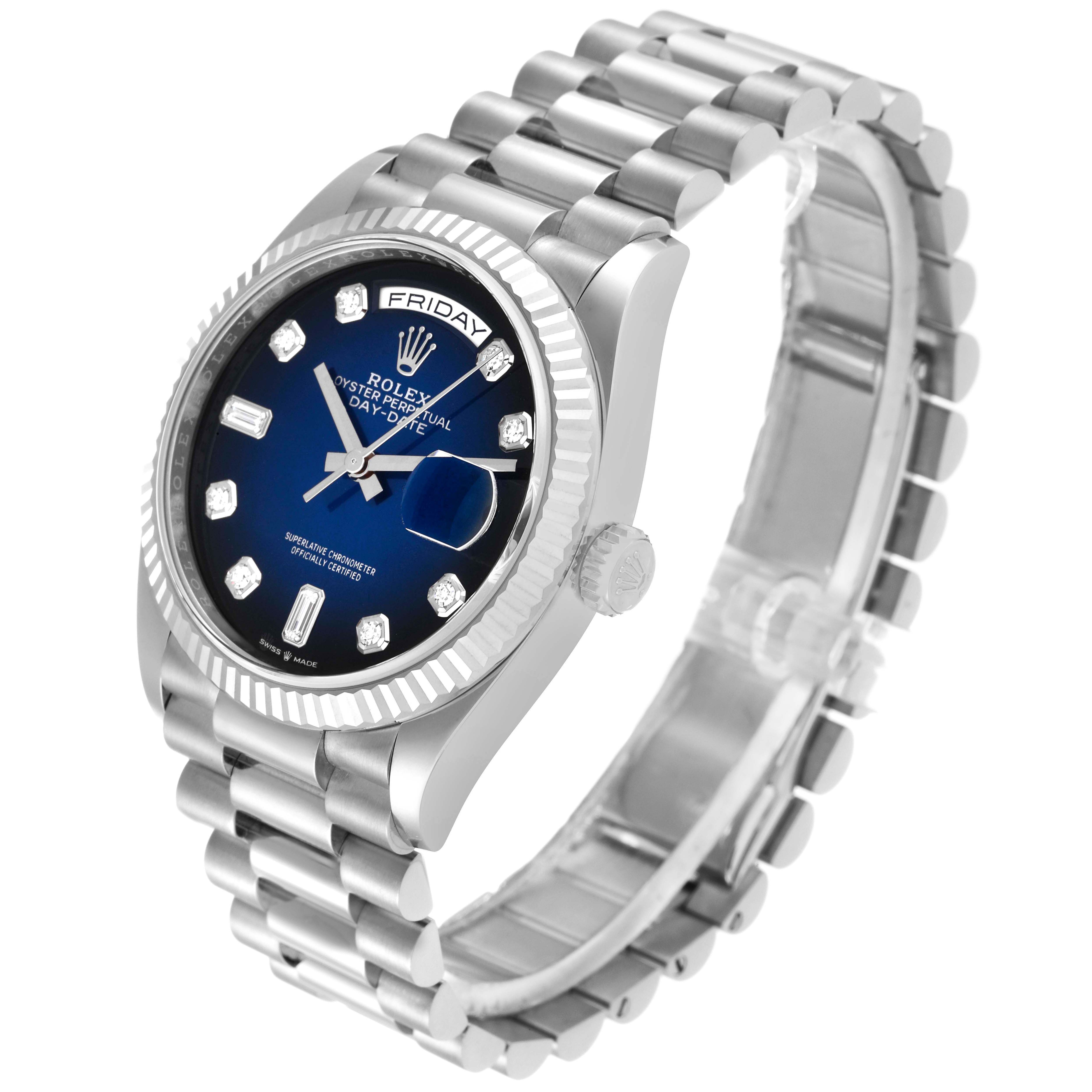 The Rolex President 128239 Men
s White Gold Blue Dial 128239 Men
s White Gold Blue Dial model watch is shown at a slight angled side view, highlighting its band, bezel, and face with date display.