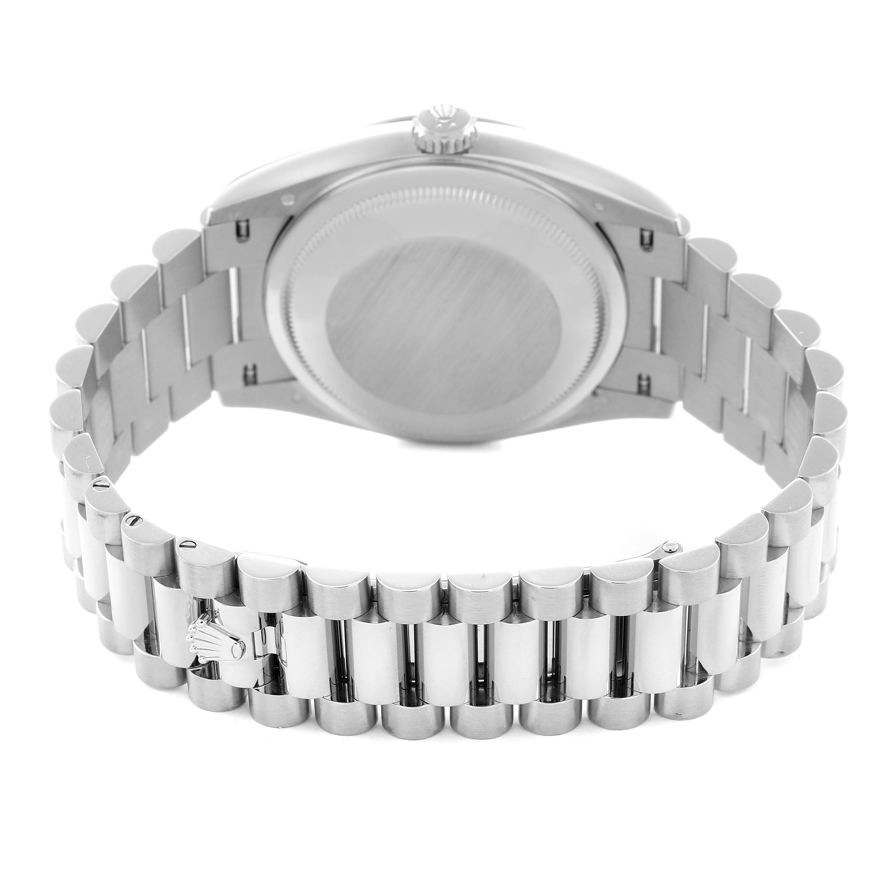 The image shows the backside of a Rolex President 128239 Men
s White Gold Blue Dial 128239 Men
s White Gold Blue Dial model, featuring its case back and signature bracelet.