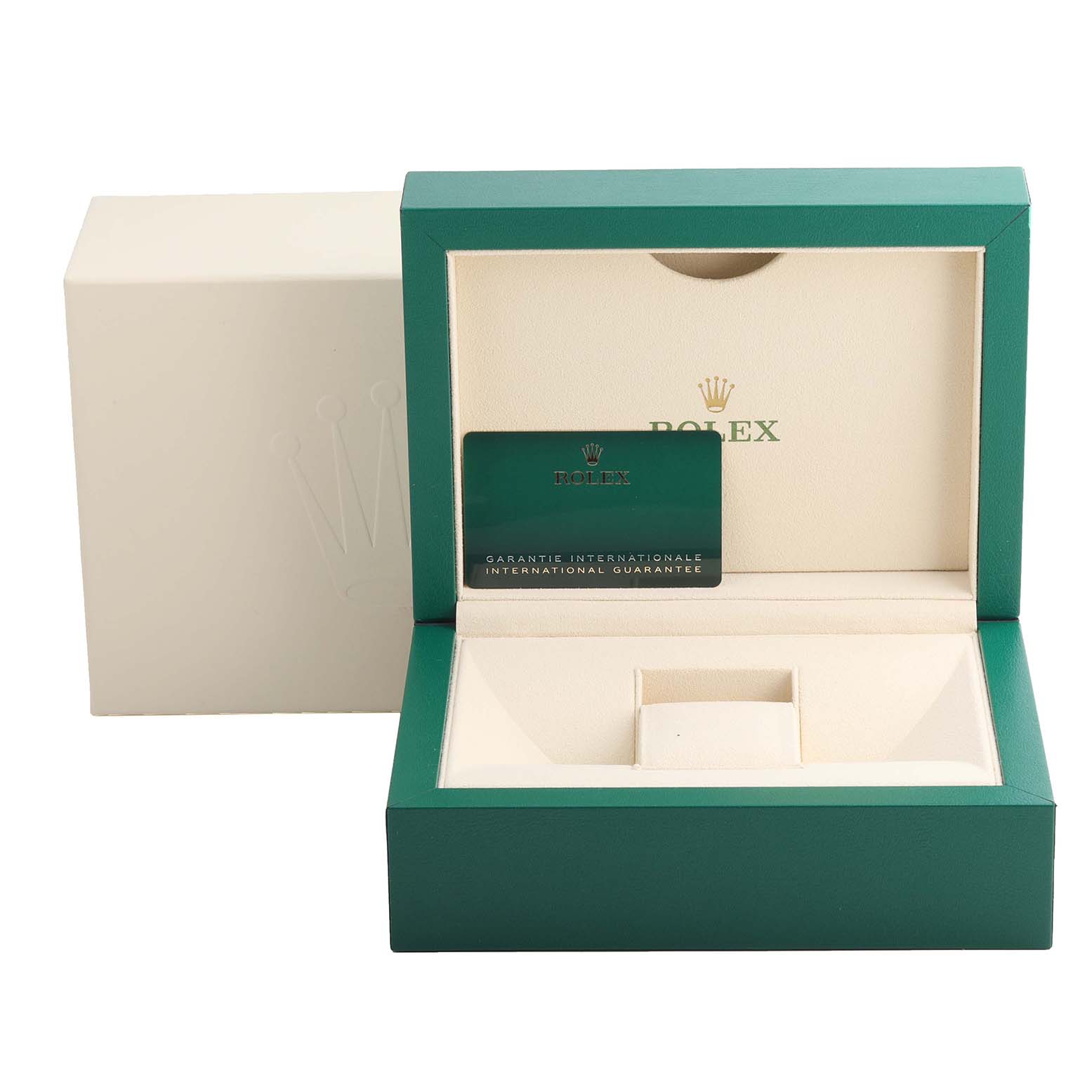 The image shows an open Rolex President 128239 Men
s White Gold Blue Dial 128239 Men
s White Gold Blue Dial watch box with an international guarantee card inside.