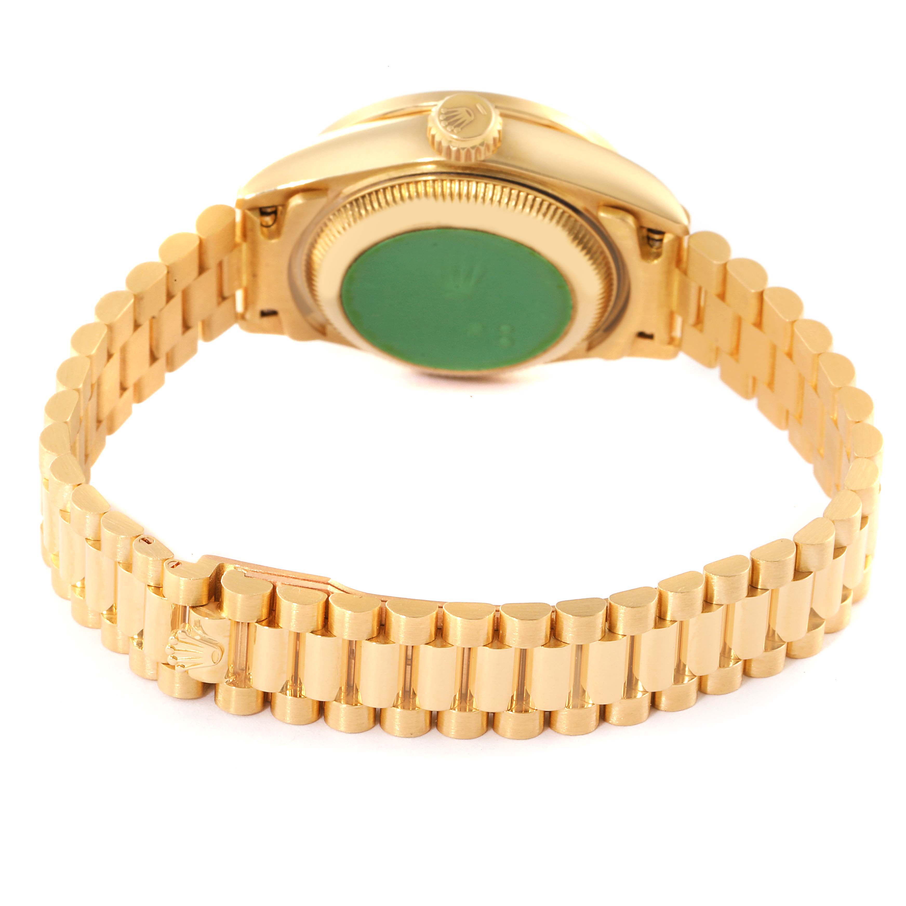 This image of the Rolex President 69198 Women's Yellow Gold  69198 Women's Yellow Gold  model shows the gold bracelet, clasp, and the back case of the watch.