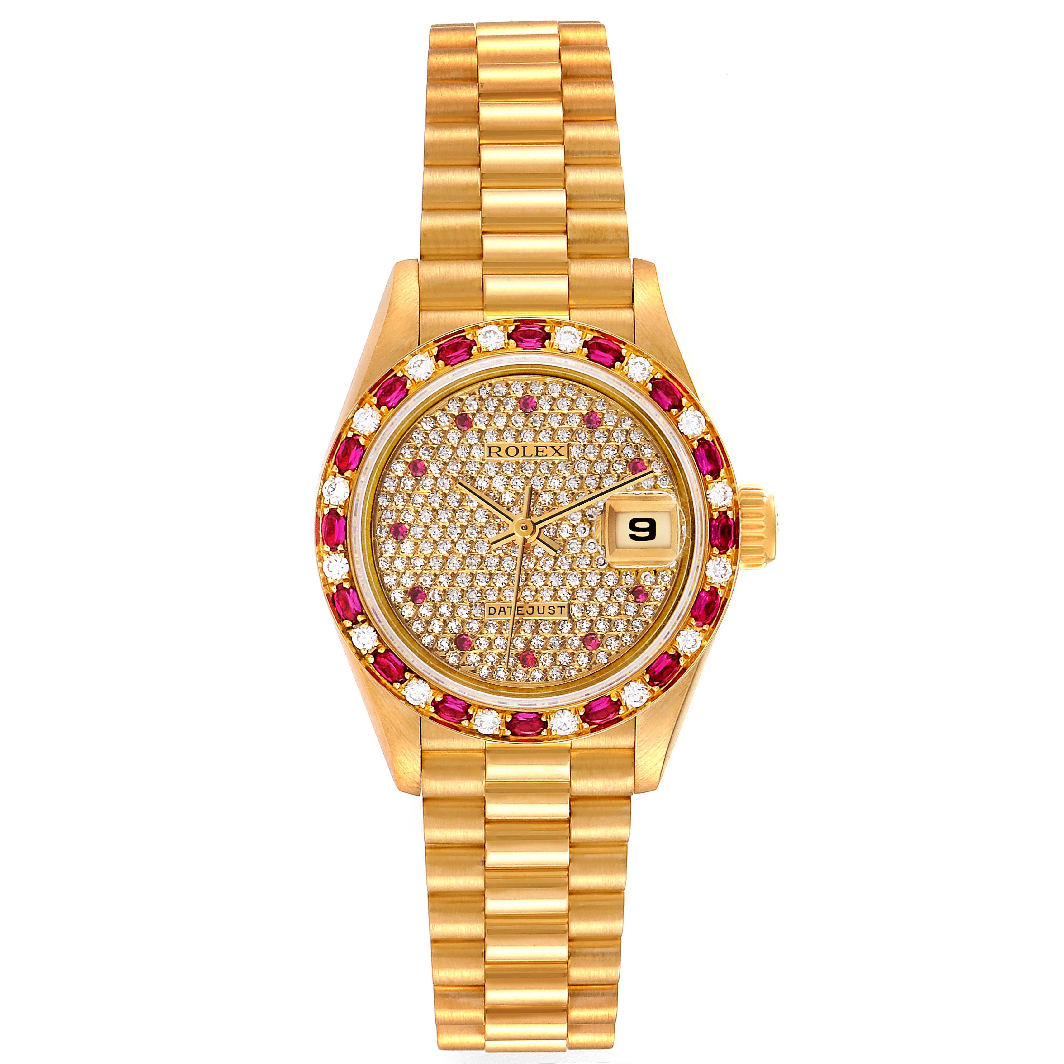 The image shows a front view of a Rolex President 69198 Women's Yellow Gold  69198 Women's Yellow Gold  model watch with a gold bracelet, diamond and ruby bezel, and a date display.