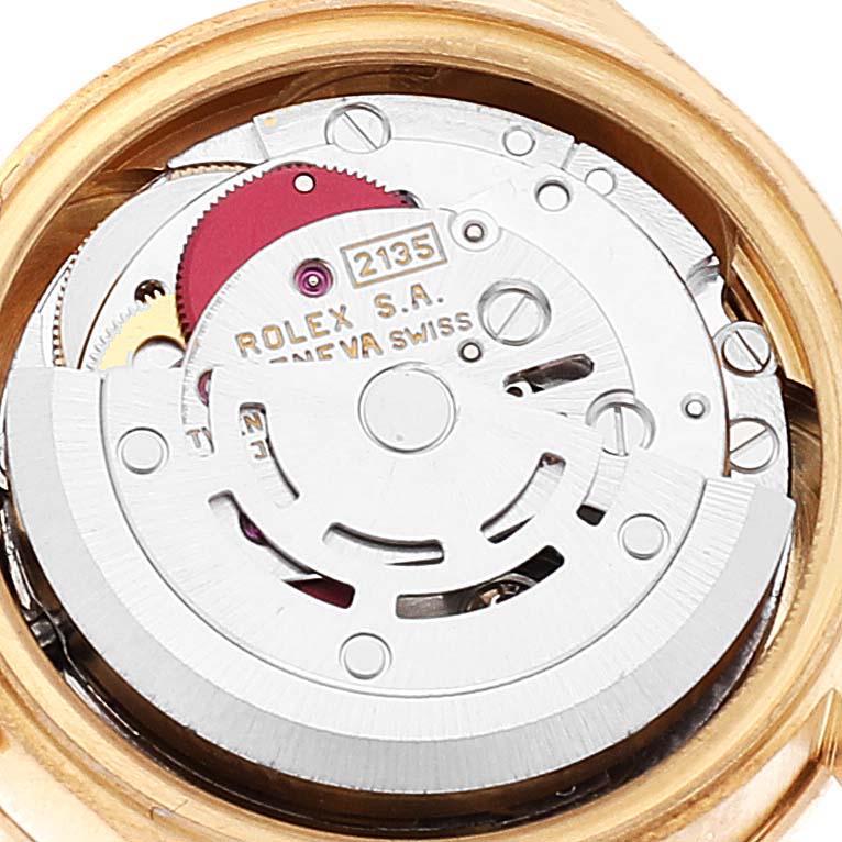This image shows the intricate inner mechanism of a Rolex President 69198 Women's Yellow Gold  69198 Women's Yellow Gold  model watch viewed from the back case.