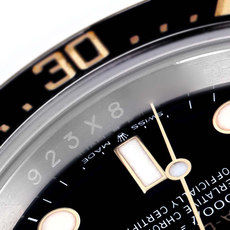 The image shows a close-up of the Rolex Sea-Dweller 126603 Men
s Steel and Gold (two tone) Black Dial 126603 Men
s Steel and Gold (two tone) Black Dial
s dial and bezel, highlighting the indices and part of the minute hand.