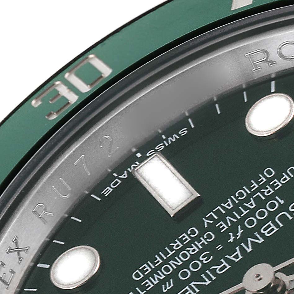 The image shows a close-up of the dial and bezel of a Rolex Submariner 116610LV Men
s Stainless Steel Green Dial 116610LV Men
s Stainless Steel Green Dial watch, highlighting the "30" mark, hands, and some text on the dial.