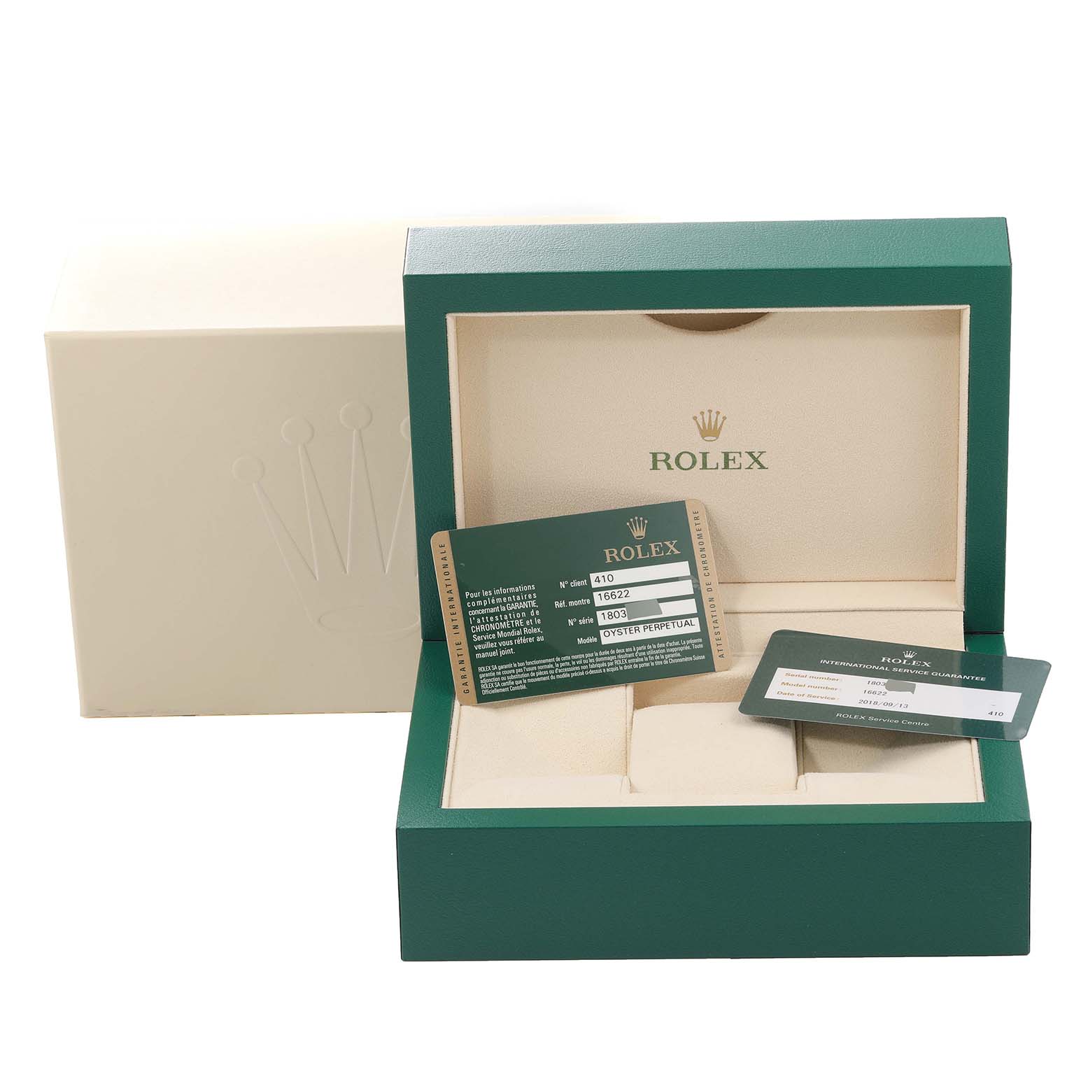 The image shows a green Rolex Yacht-Master 16622 Men
s Stainless Steel Silver Dial 16622 Men
s Stainless Steel Silver Dial watch box and warranty cards from a front-facing angle.