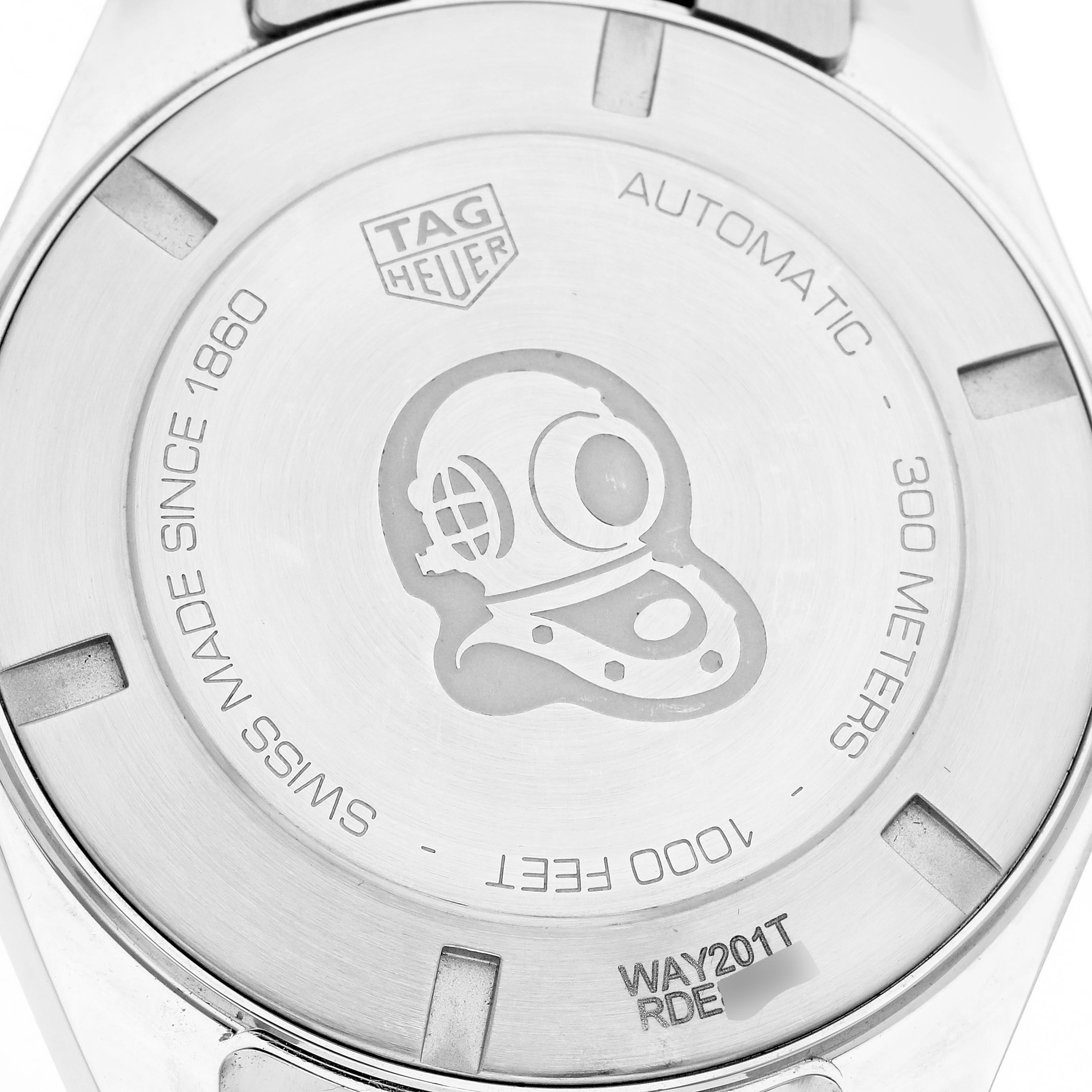 The image shows the case back of a Tag Heuer Aquaracer WAY201T Men
s Stainless Steel Blue Dial WAY201T Men
s Stainless Steel Blue Dial watch, featuring the brand logo and diver helmet engraving.