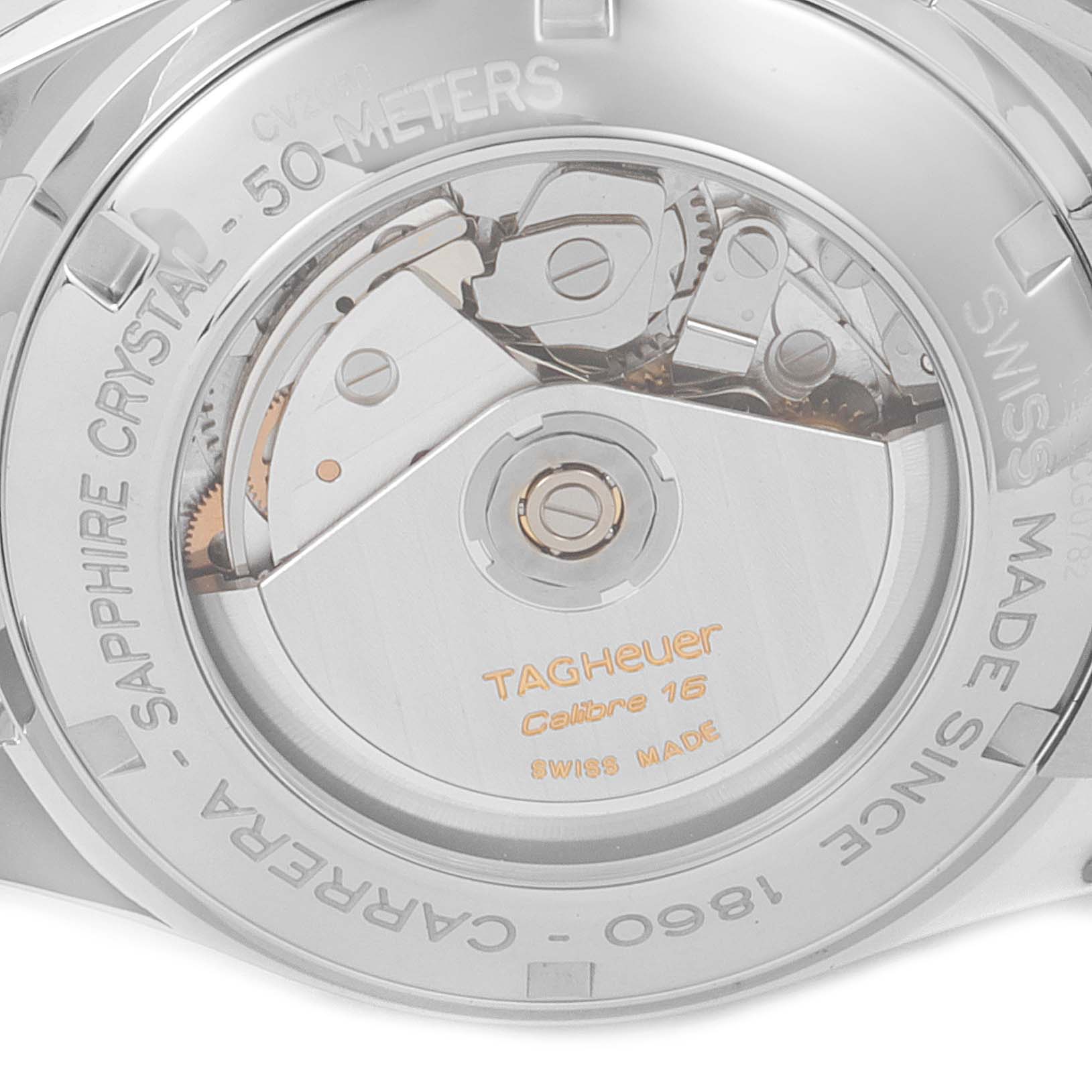 The image shows the back of the Tag Heuer Carrera CV2050.BD0789 Men's Steel and Gold (two tone) Silver Dial CV2050.BD0789 Men's Steel and Gold (two tone) Silver Dial watch, revealing its Calibre 16 movement and case engravings.