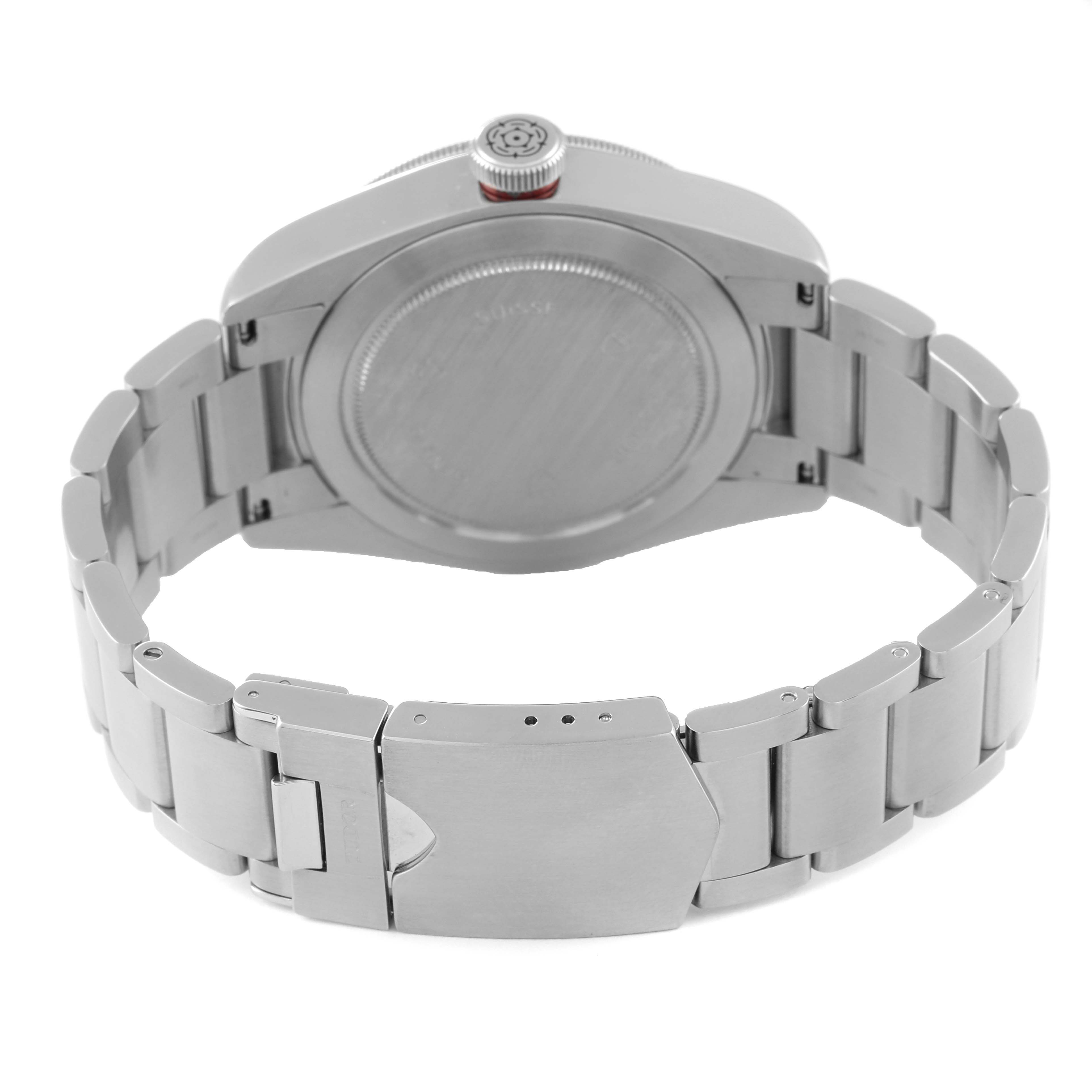 The image shows the back case and bracelet clasp of the Heritage Black Bay watch by Tudor.
