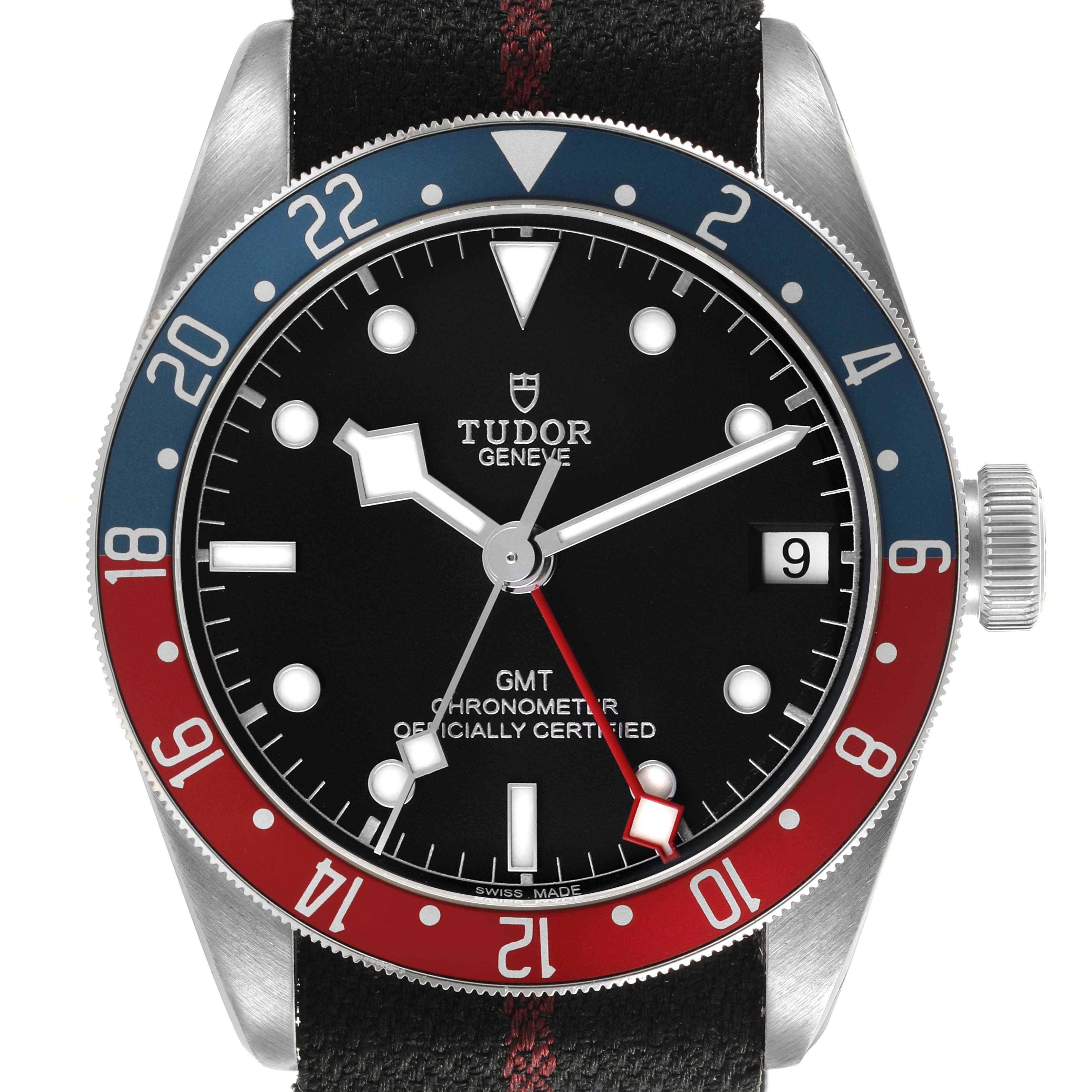 The Tudor Heritage Black Bay 79830RB Men's Stainless Steel Black Dial watch is shown from a front-facing angle, highlighting the dial, bezel, and crown.