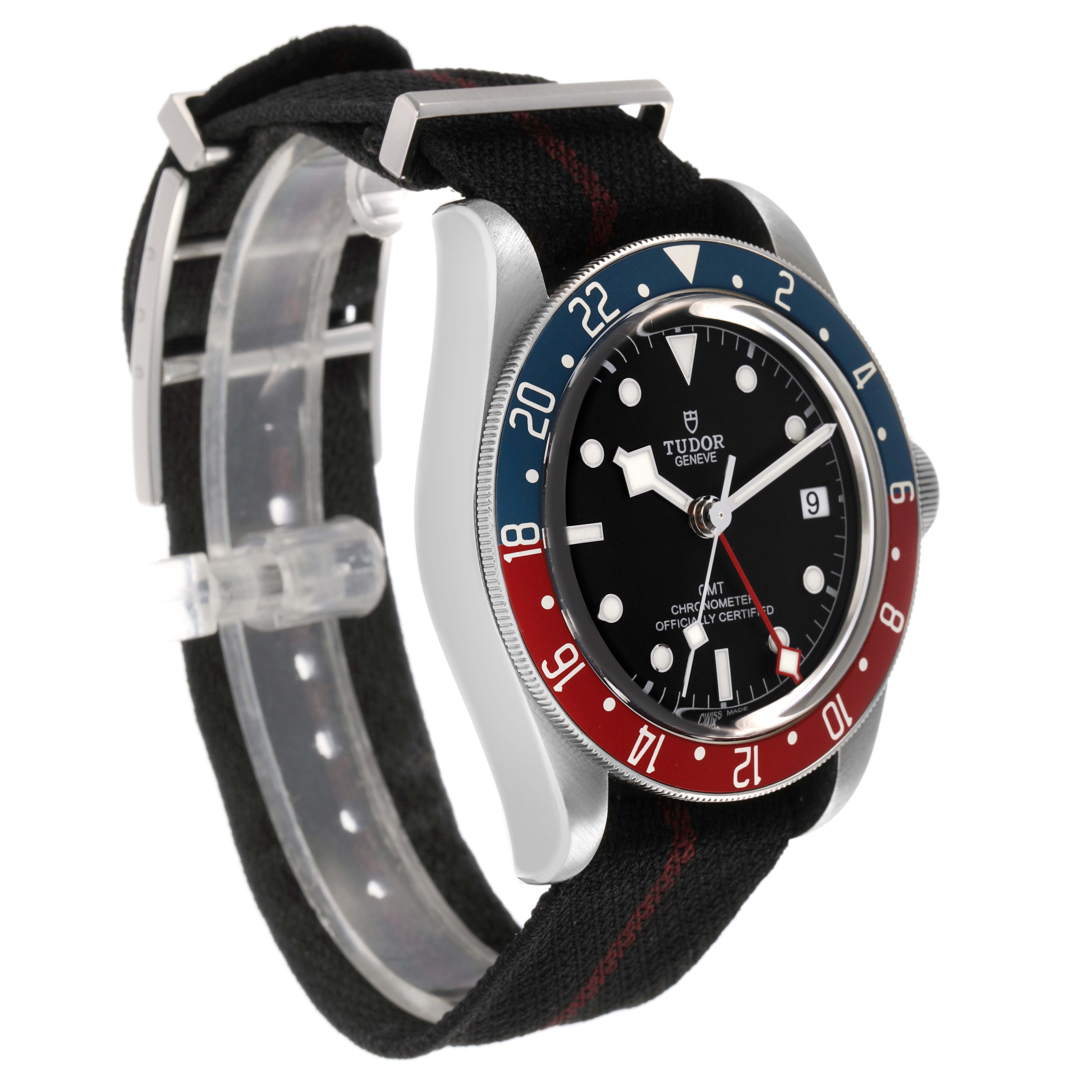 The Tudor Heritage Black Bay 79830RB Men's Stainless Steel Black Dial watch is shown at an angle highlighting its face, bezel, and strap.