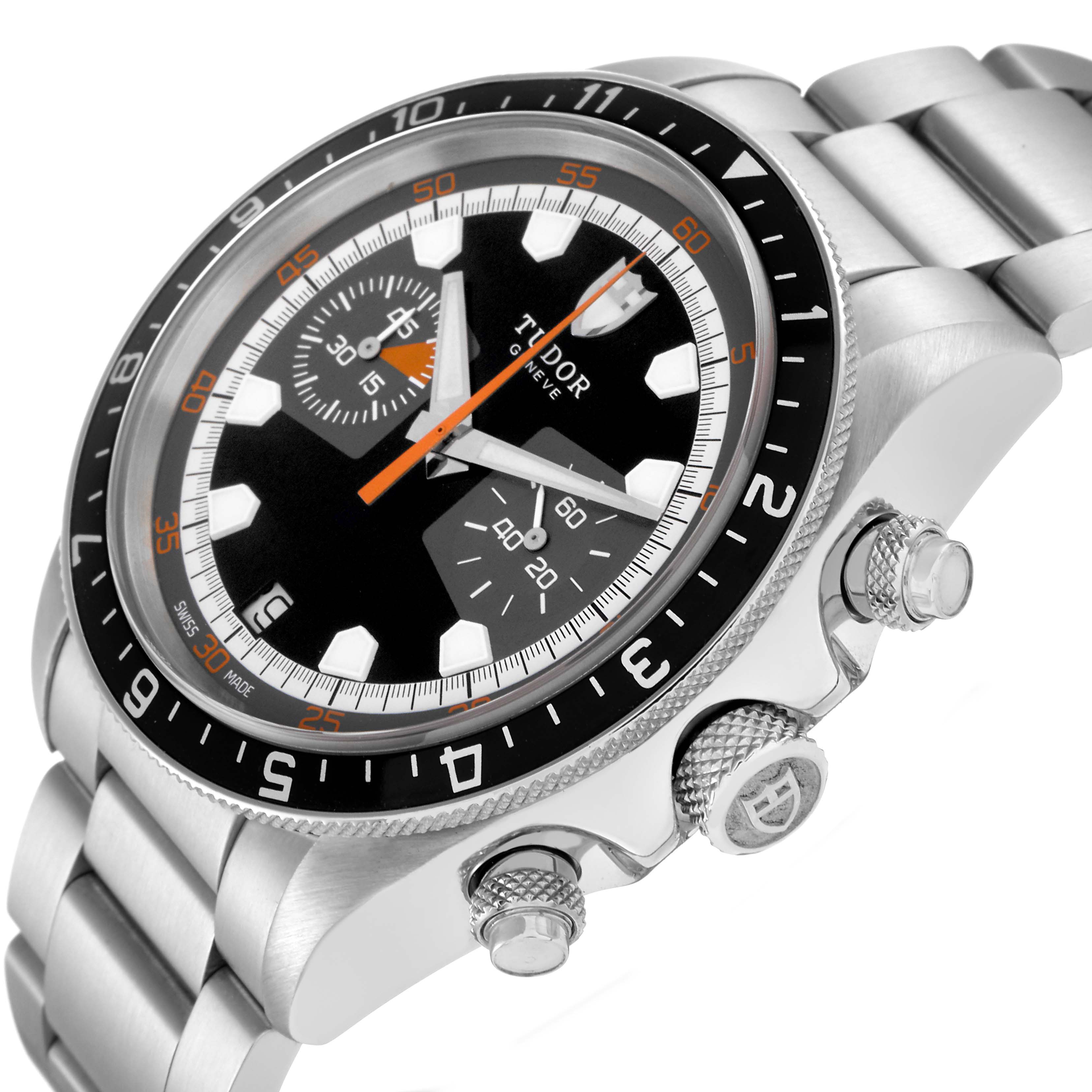 The Tudor Heritage Chrono 70330 Men's Stainless Steel Black Dial 70330 Men's Stainless Steel Black Dial watch is shown at an angled side view, highlighting the dial, bezel, buttons, and bracelet.