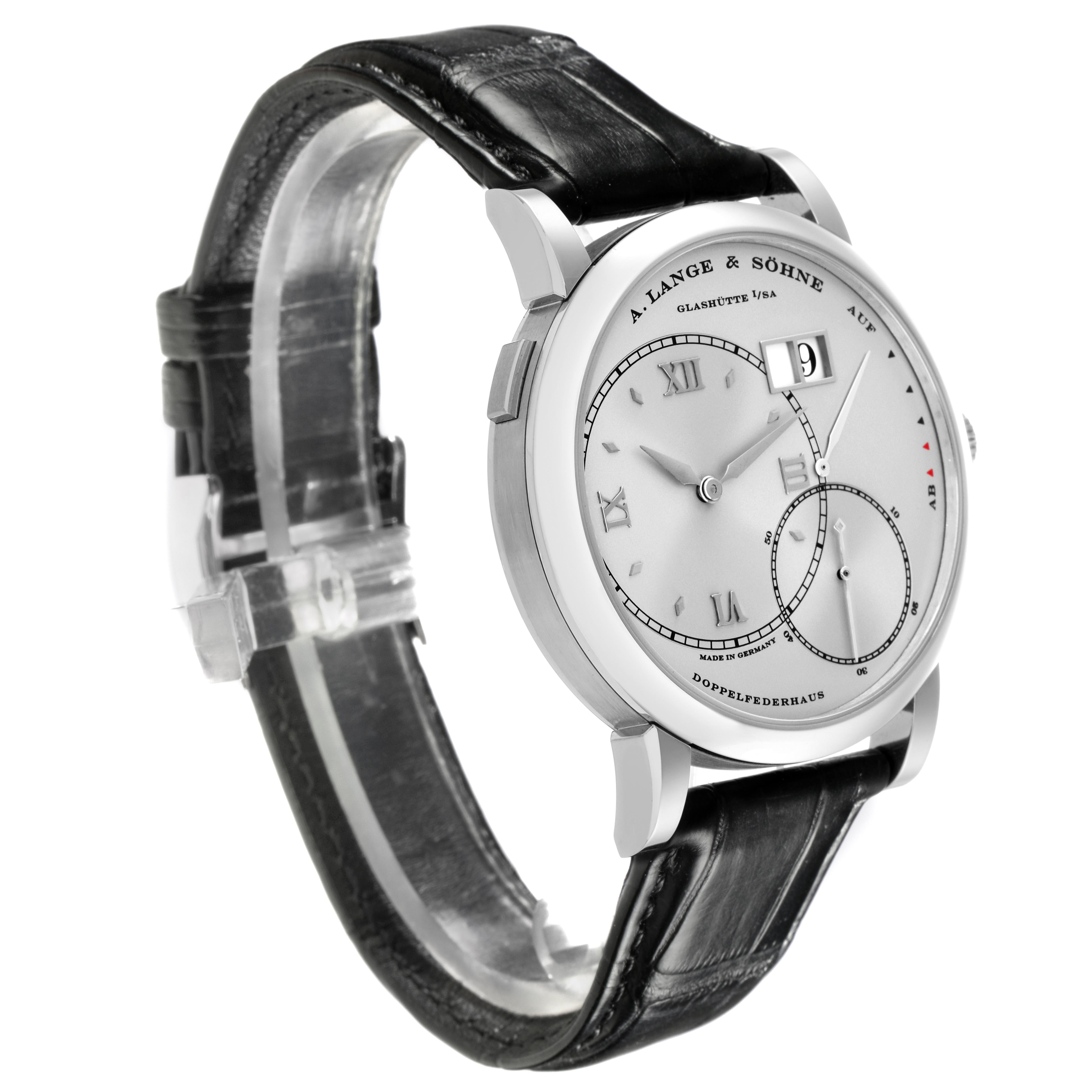 The Lange 1 by A. Lange & Söhne is shown at a three-quarter angle, highlighting the dial, case, and leather strap.