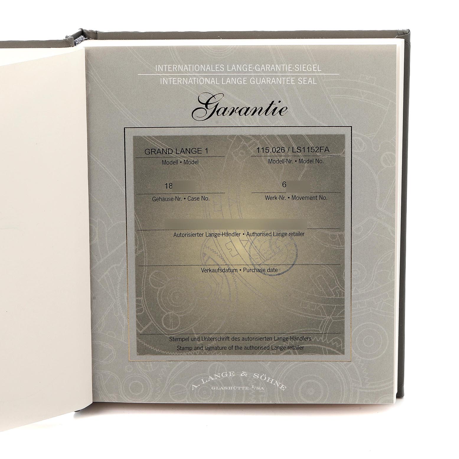 This image shows the warranty certificate for the A. Lange & Sohne Lange 1 115.026 Men's Platinum Silver Dial model, detailing model and case information.