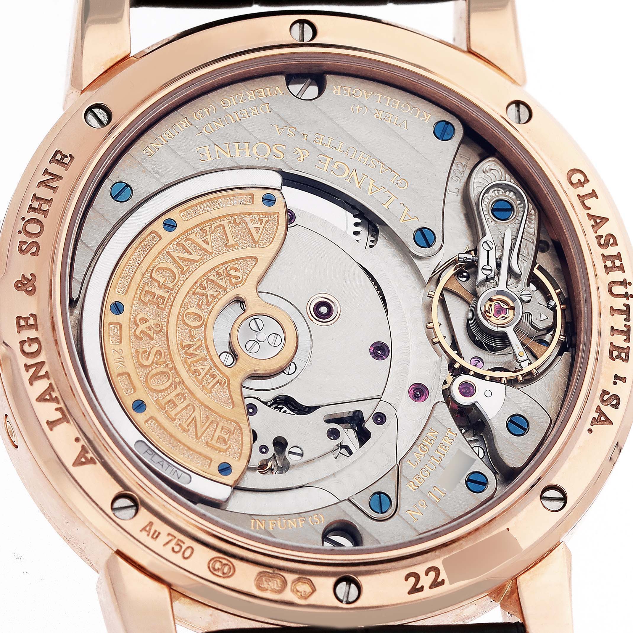 The image shows the case back of the Richard Lange model by A. Lange & Söhne, revealing the intricate movement and engravings.