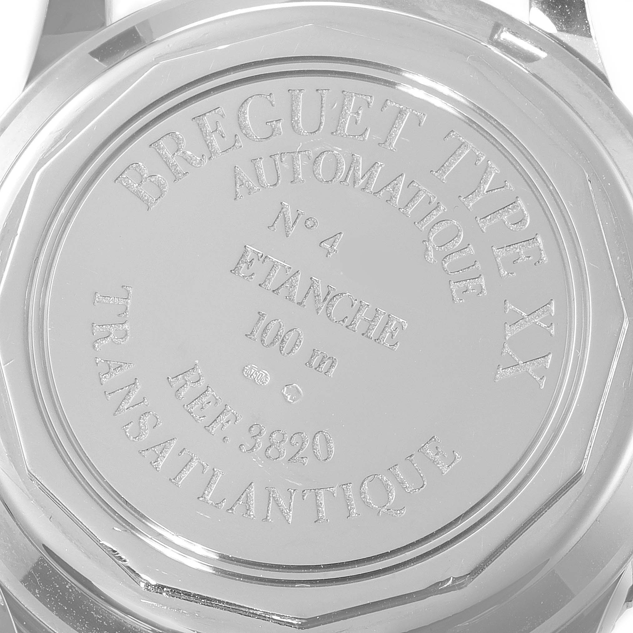 The image shows the back case of a Breguet Type XX model, featuring engravings with specifications and model details.
