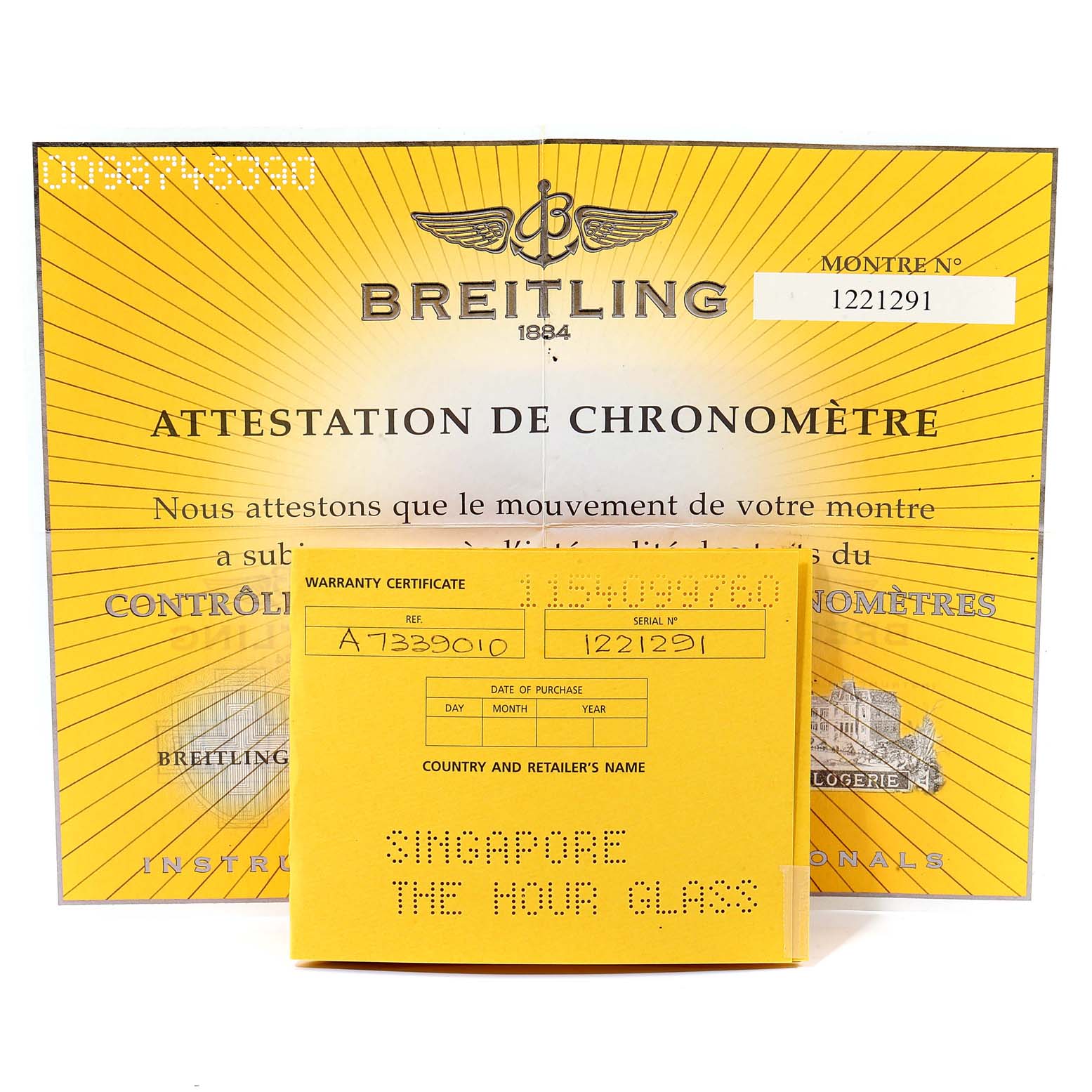 The image shows a Breitling Avenger A73390 Men
s Stainless Steel Silver Dial A73390 Men
s Stainless Steel Silver Dial model warranty certificate and chronometer certification document.
