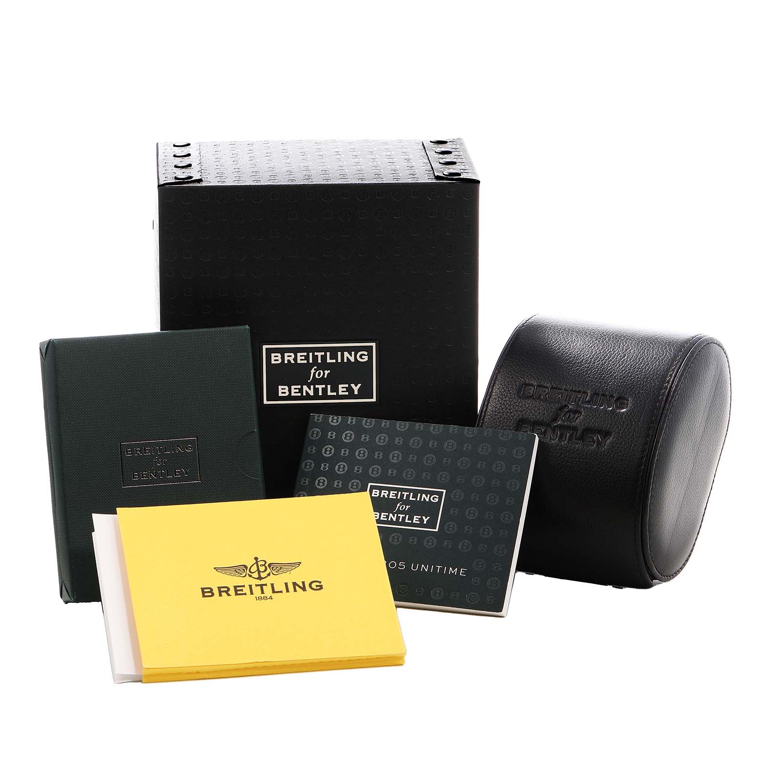 The image shows Breitling for Bentley packaging and accessories including boxes, booklets, and a leather case.