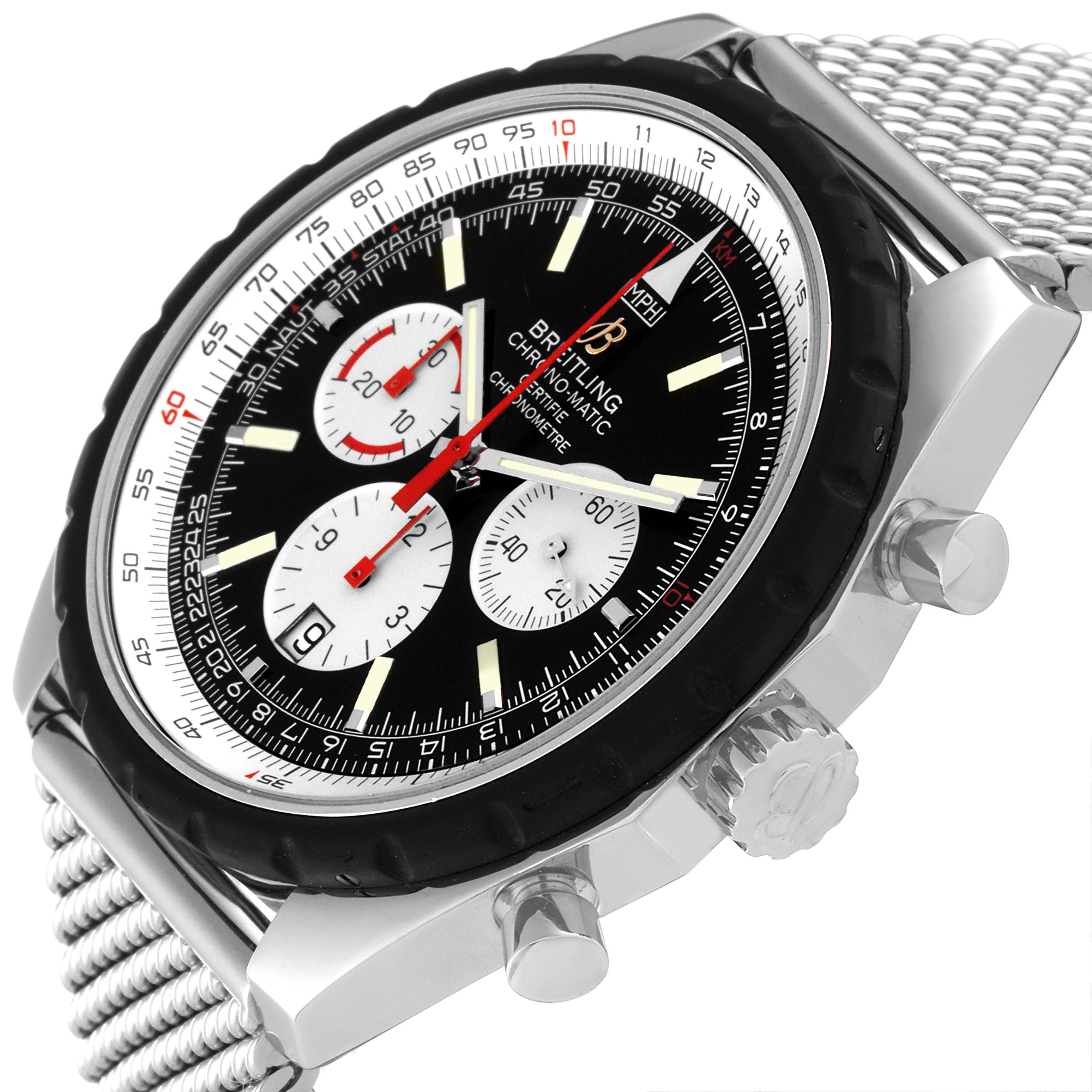 The image shows a close-up side angle of the Breitling Chronomatic A14360 Men's Stainless Steel Black Dial A14360 Men's Stainless Steel Black Dial watch, revealing its face, crown, pushers, and mesh band.