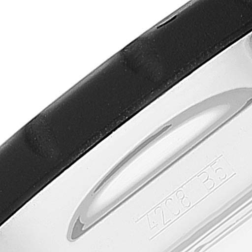 This image shows a close-up angle of the side of a Breitling Chronomatic A14360 Men's Stainless Steel Black Dial A14360 Men's Stainless Steel Black Dial watch, focusing on the bezel and part of the case.