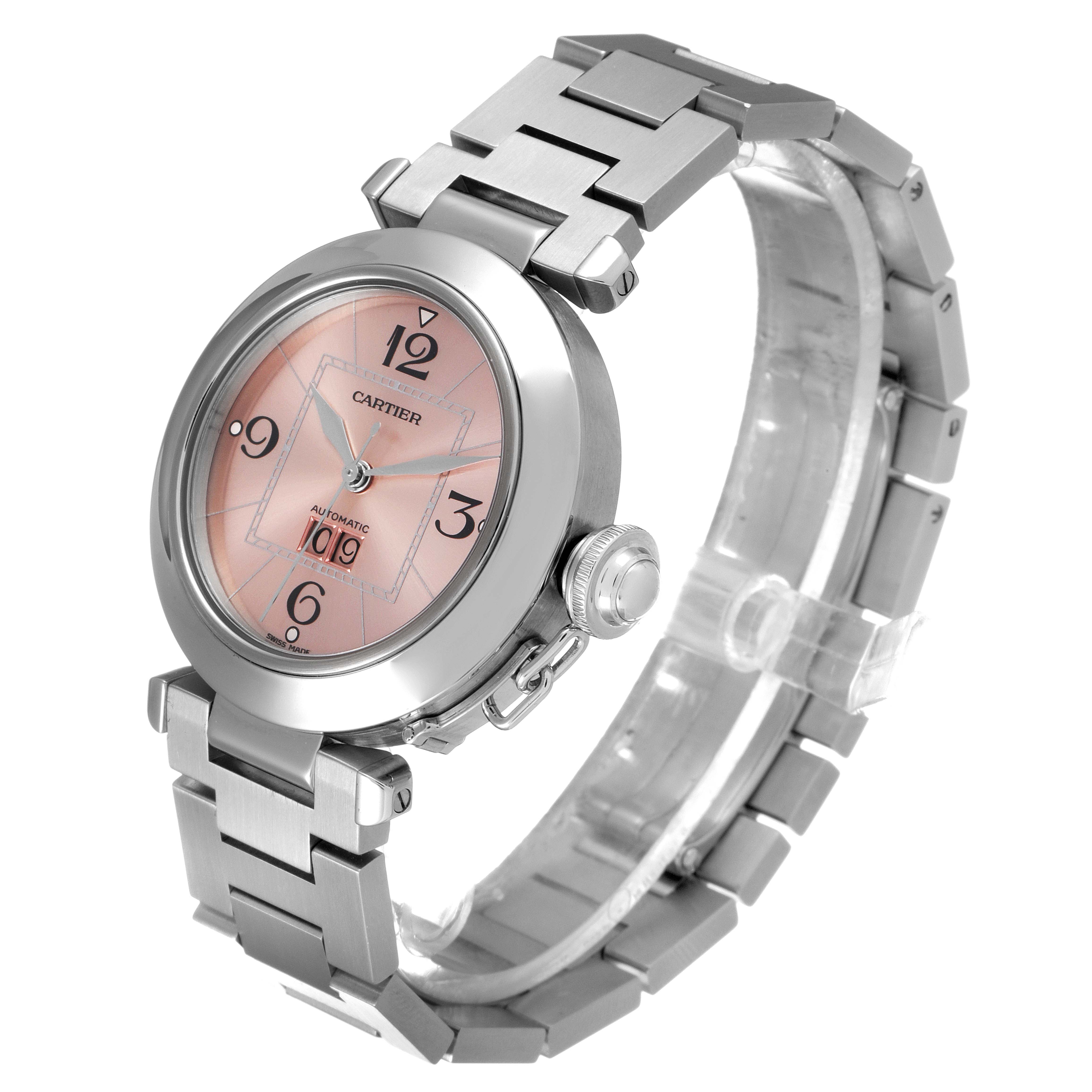 The Cartier Pasha W31058M7 Women
s Stainless Steel Pink Dial W31058M7 Women
s Stainless Steel Pink Dial watch is shown from an angled front view, displaying the dial, crown, and metal bracelet.
