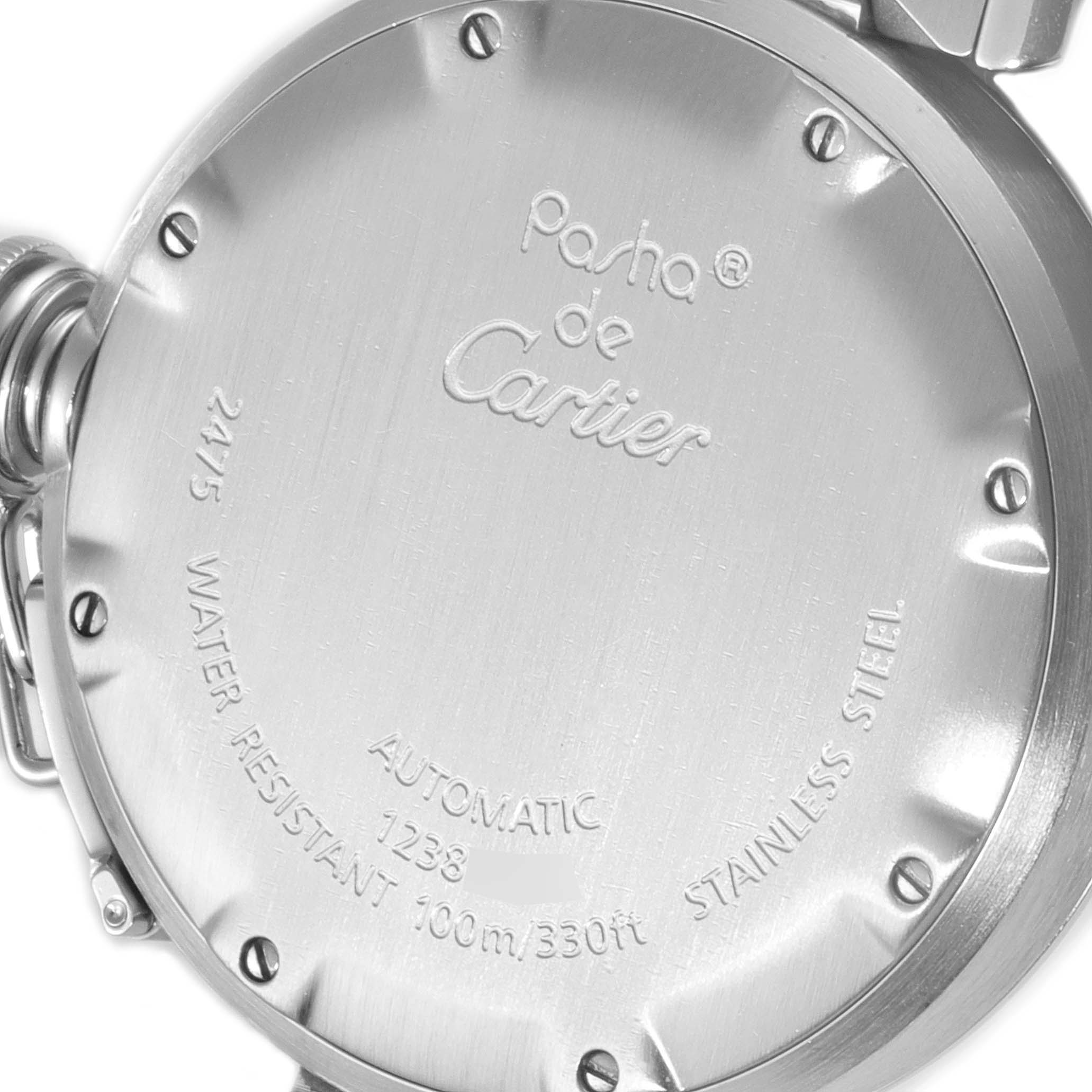 The image shows the back case of a Cartier Pasha W31058M7 Women
s Stainless Steel Pink Dial W31058M7 Women
s Stainless Steel Pink Dial watch, displaying engravings with model details and specifications.