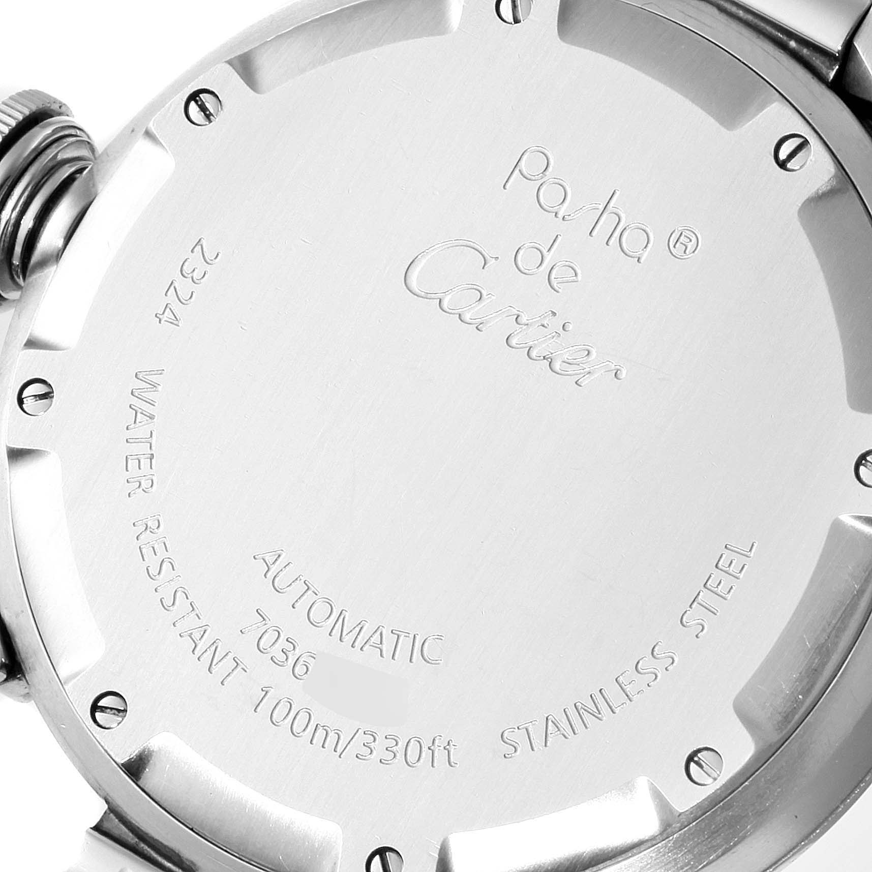 This image shows the stainless steel case back of a Cartier Pasha W31075M7 Women's Stainless Steel Pink Dial W31075M7 Women's Stainless Steel Pink Dial watch, highlighting its inscriptions and water resistance details.