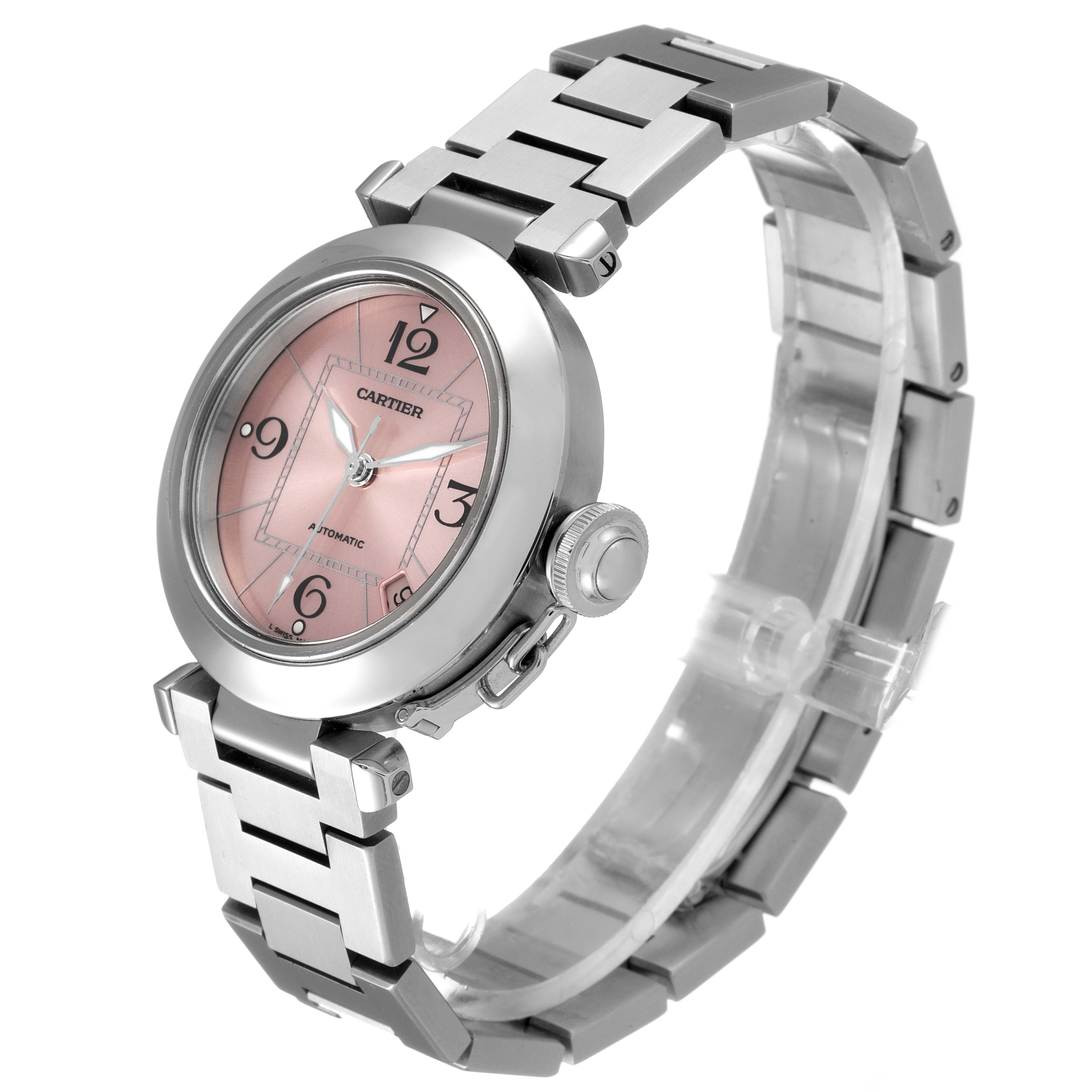 The Cartier Pasha W31075M7 Women's Stainless Steel Pink Dial W31075M7 Women's Stainless Steel Pink Dial watch is shown at an angle highlighting the face, crown, and bracelet.