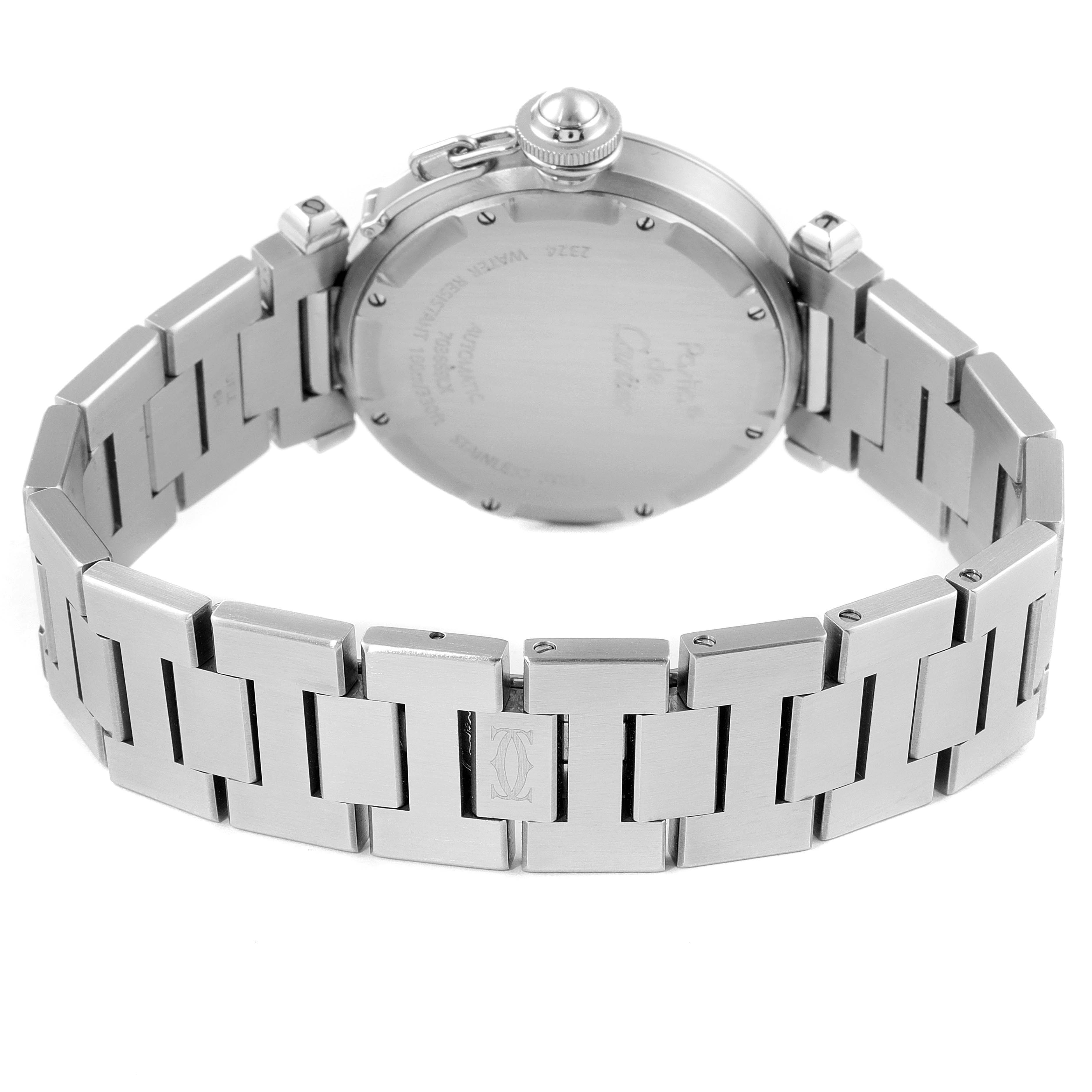 This image shows the back case and metal bracelet of a Pasha model watch by Cartier.
