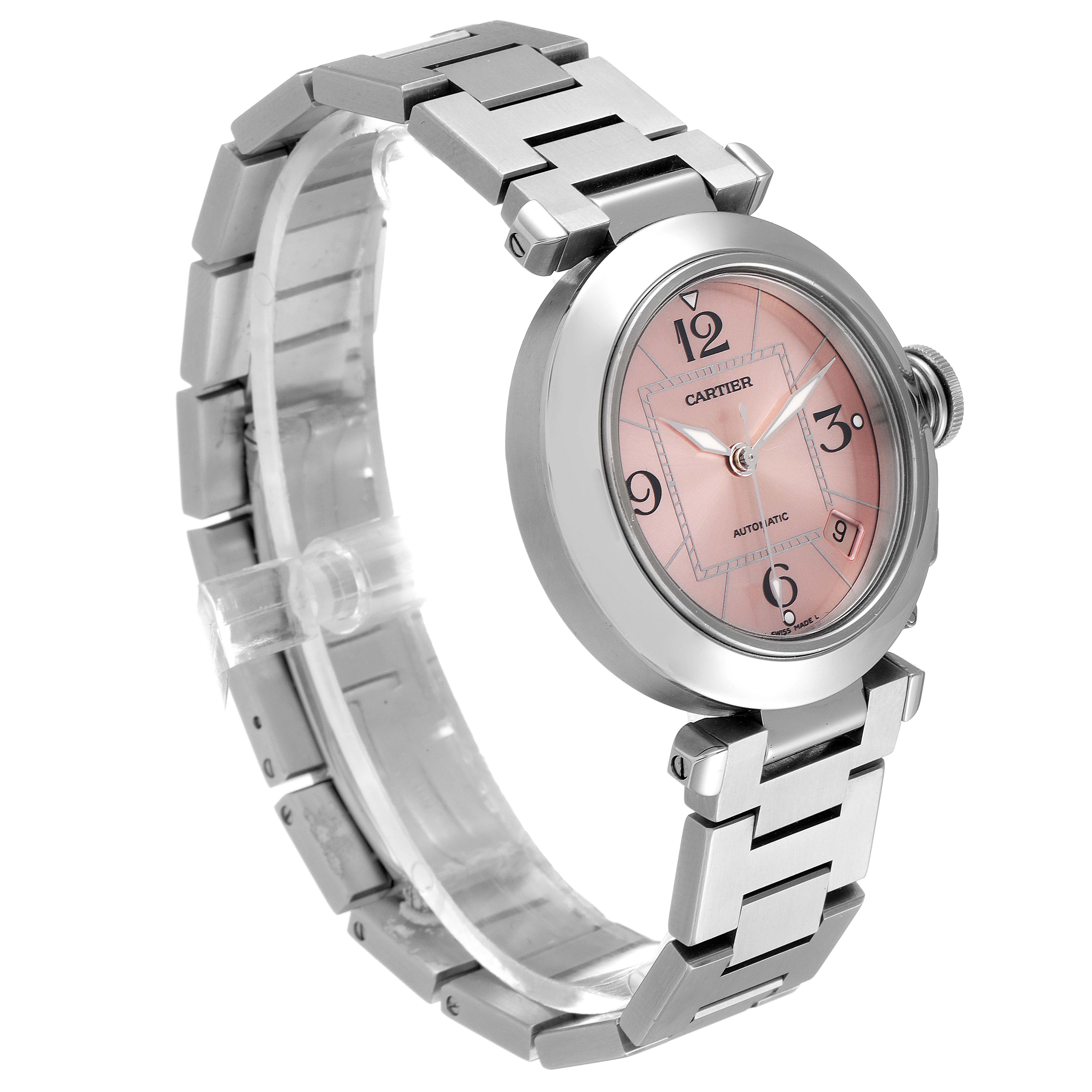 The image shows a Cartier Pasha W31075M7 Women's Stainless Steel Pink Dial W31075M7 Women's Stainless Steel Pink Dial watch at an oblique angle, highlighting its pink dial, steel bracelet, and crown.