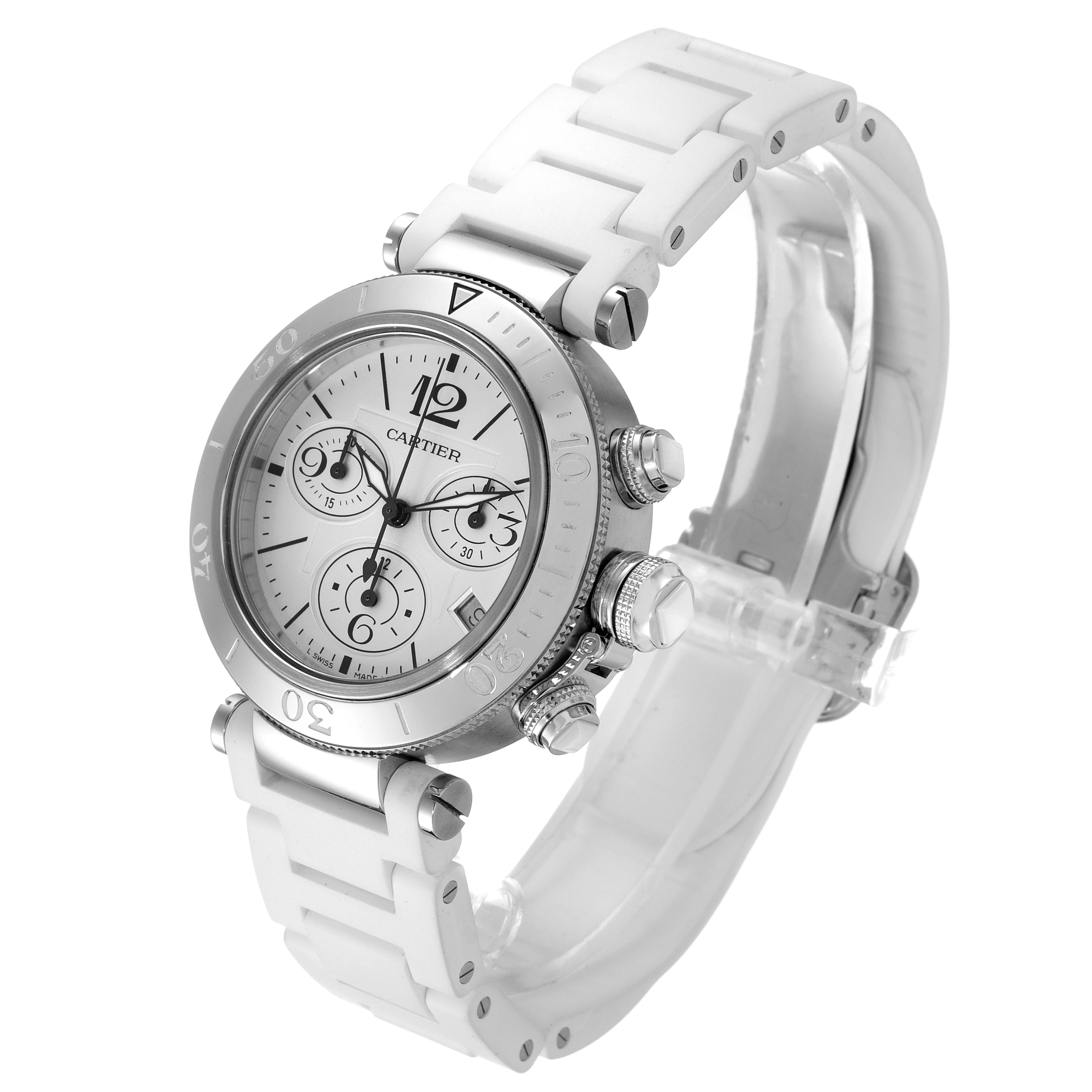 The image shows a side angle view of the Cartier Pasha W3140005 Women's Stainless Steel White Dial W3140005 Women's Stainless Steel White Dial watch, highlighting the face, bezel, and white strap.