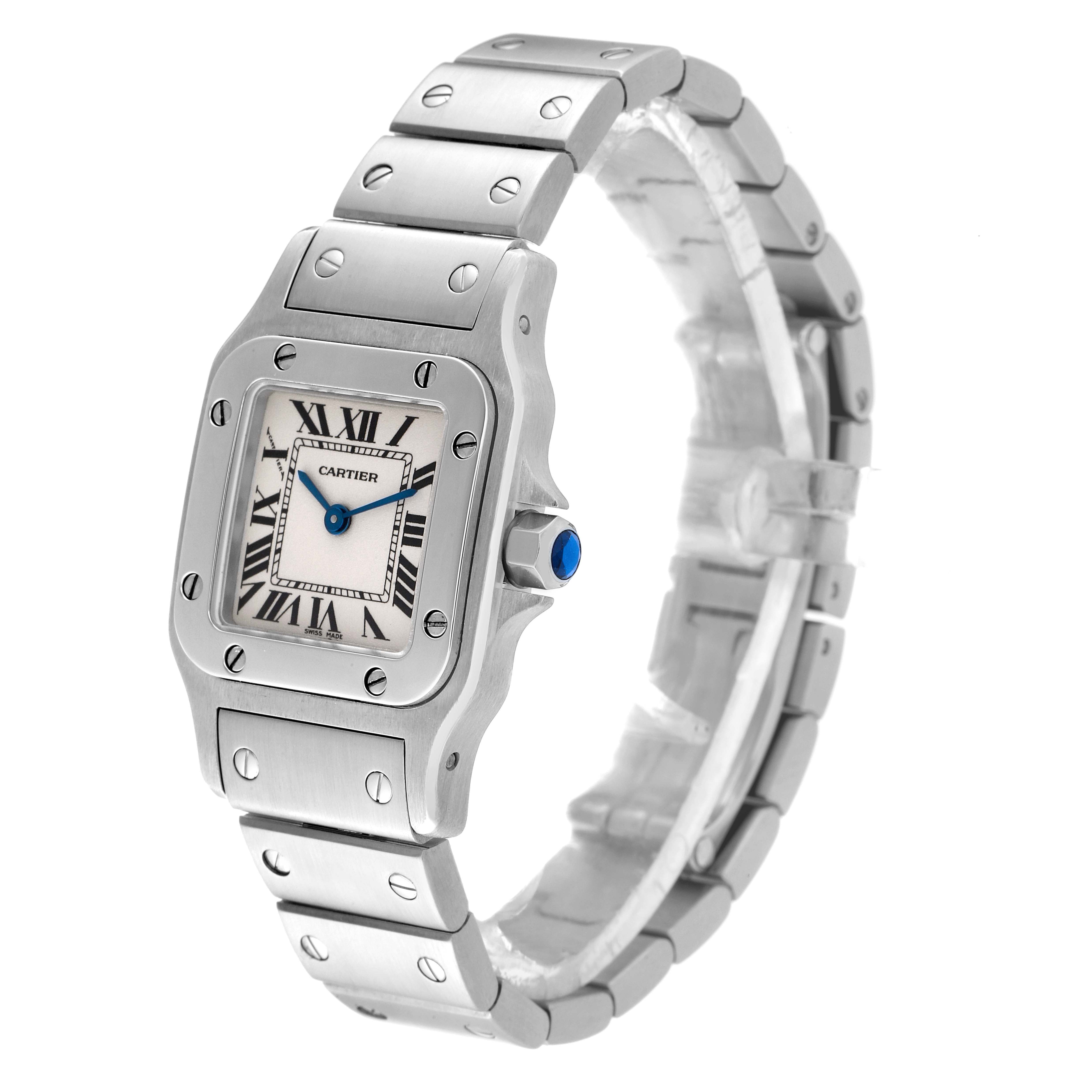 The image shows a Cartier Santos W20056D6 Women's Stainless Steel Silver Dial W20056D6 Women's Stainless Steel Silver Dial watch from an angled side view, highlighting the face, bezel, and part of the bracelet.