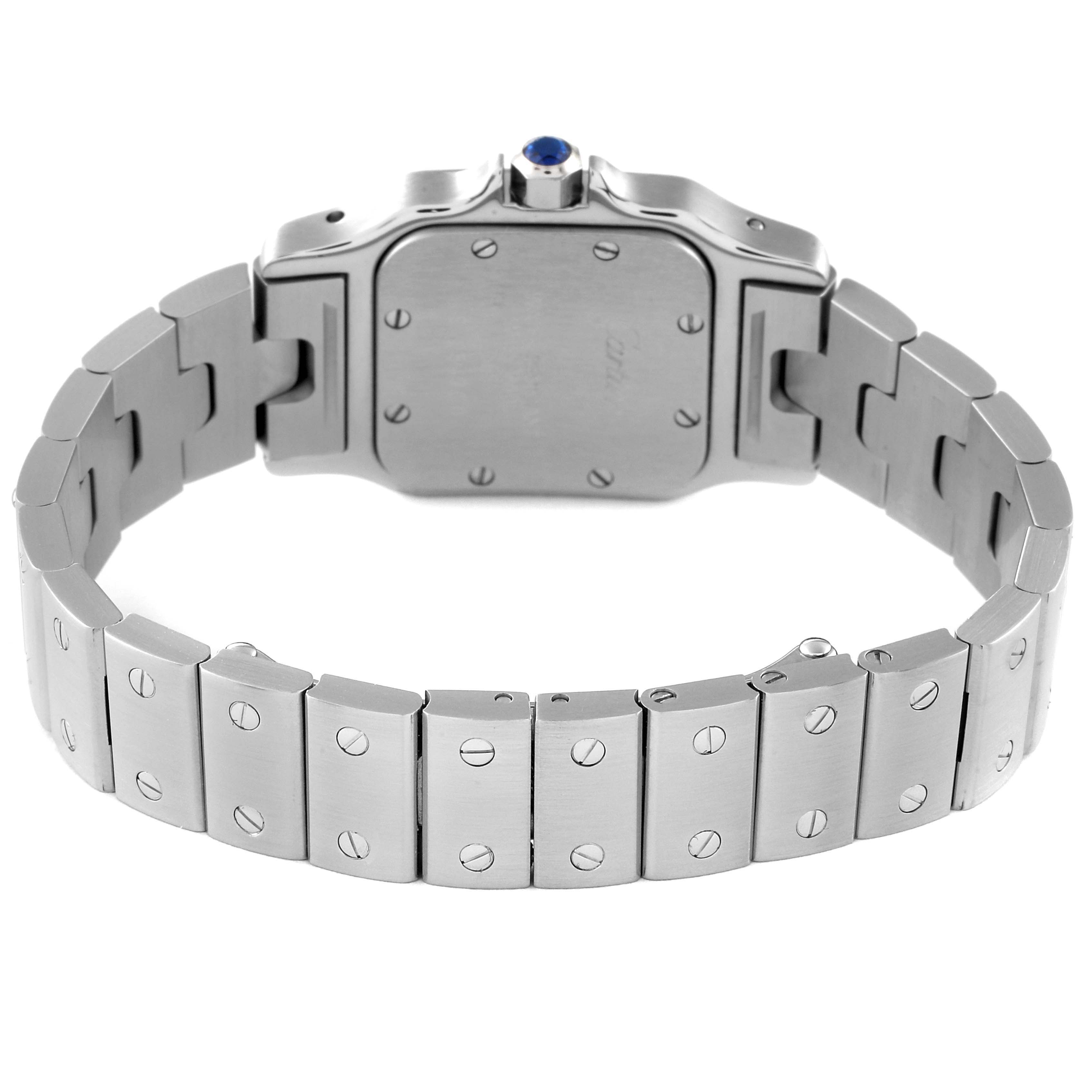 This image shows the backside and bracelet of a Cartier Santos W20056D6 Women
s Stainless Steel Silver Dial W20056D6 Women
s Stainless Steel Silver Dial watch, detailing the case back and metal links.