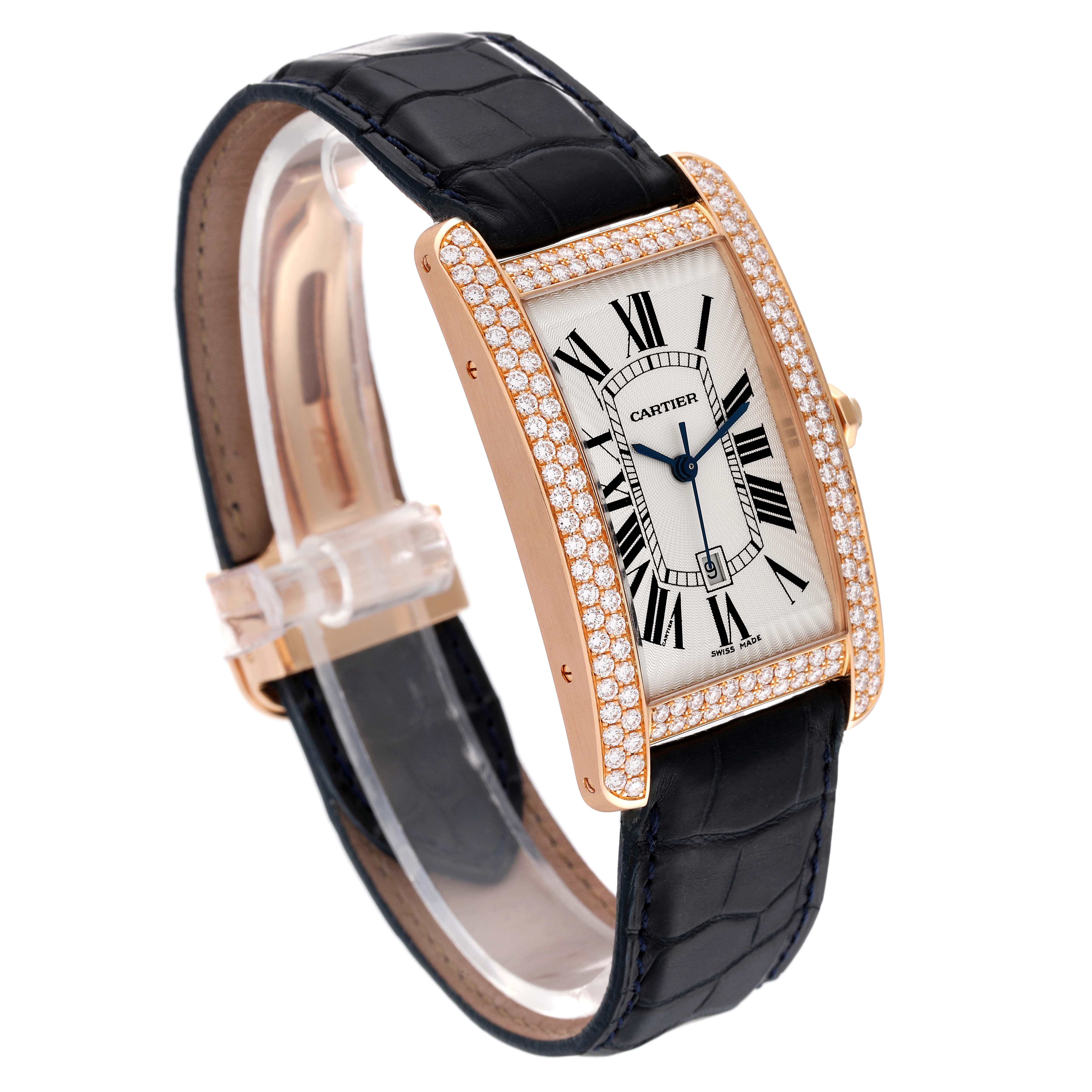 The Cartier Tank Americaine WB704851 Men's Rose Gold Silver Dial WB704851 Men's Rose Gold Silver Dial watch is shown at an angled view, displaying its rectangular face, diamond-studded bezel, and black leather strap.