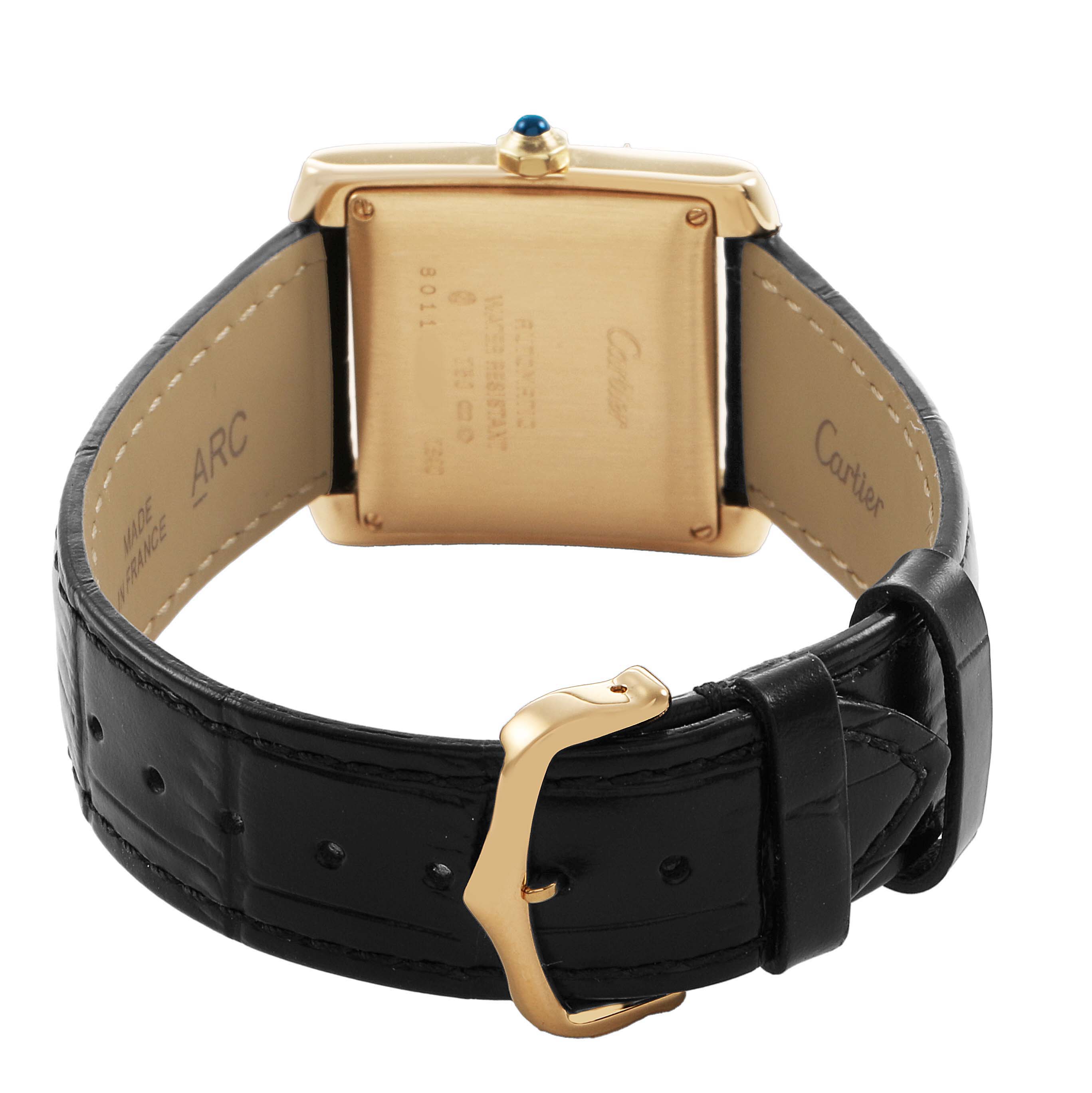 The image shows the back and strap of the Cartier Tank Française watch, highlighting the clasp and case back.