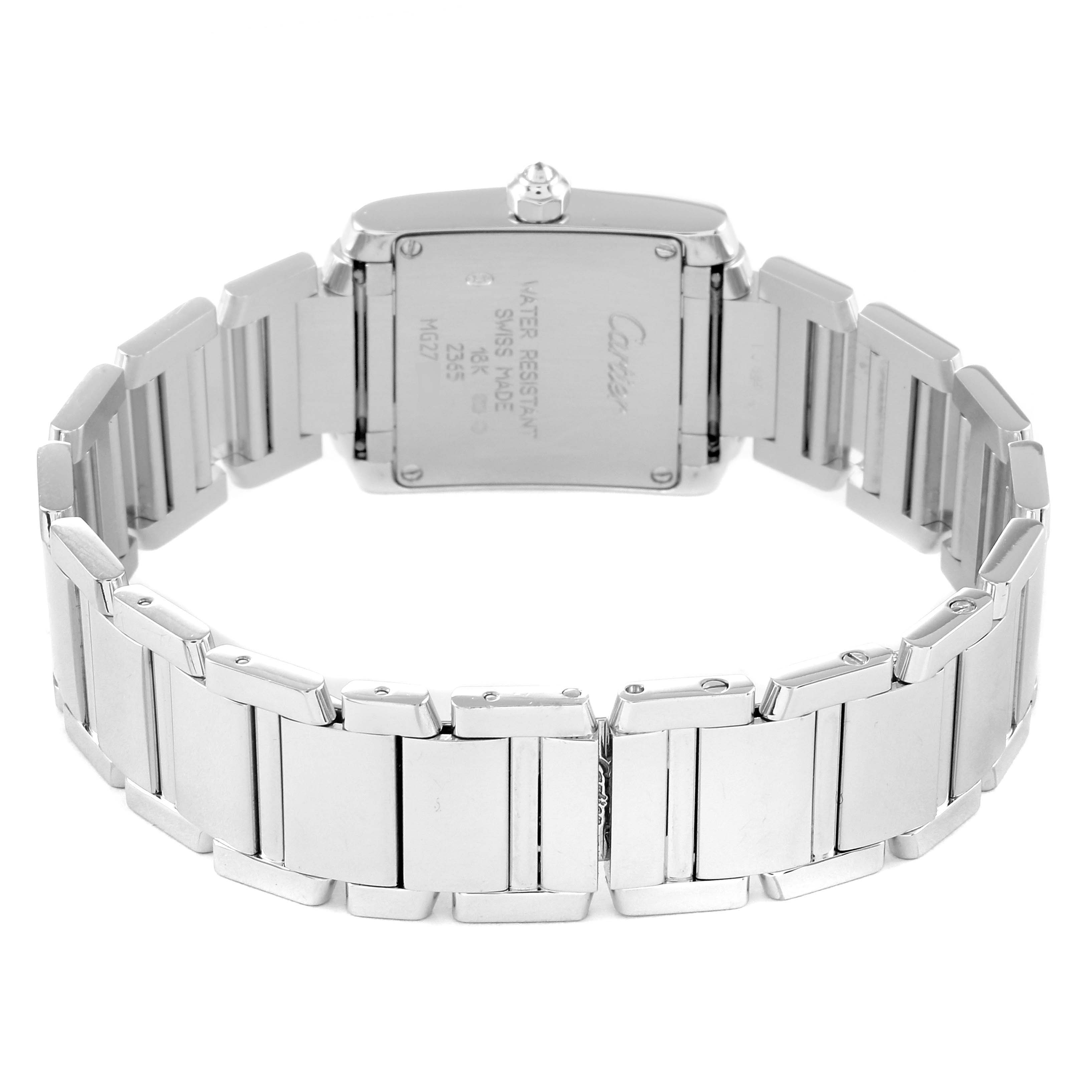 The image shows the back case and bracelet of a Cartier Tank Française watch.