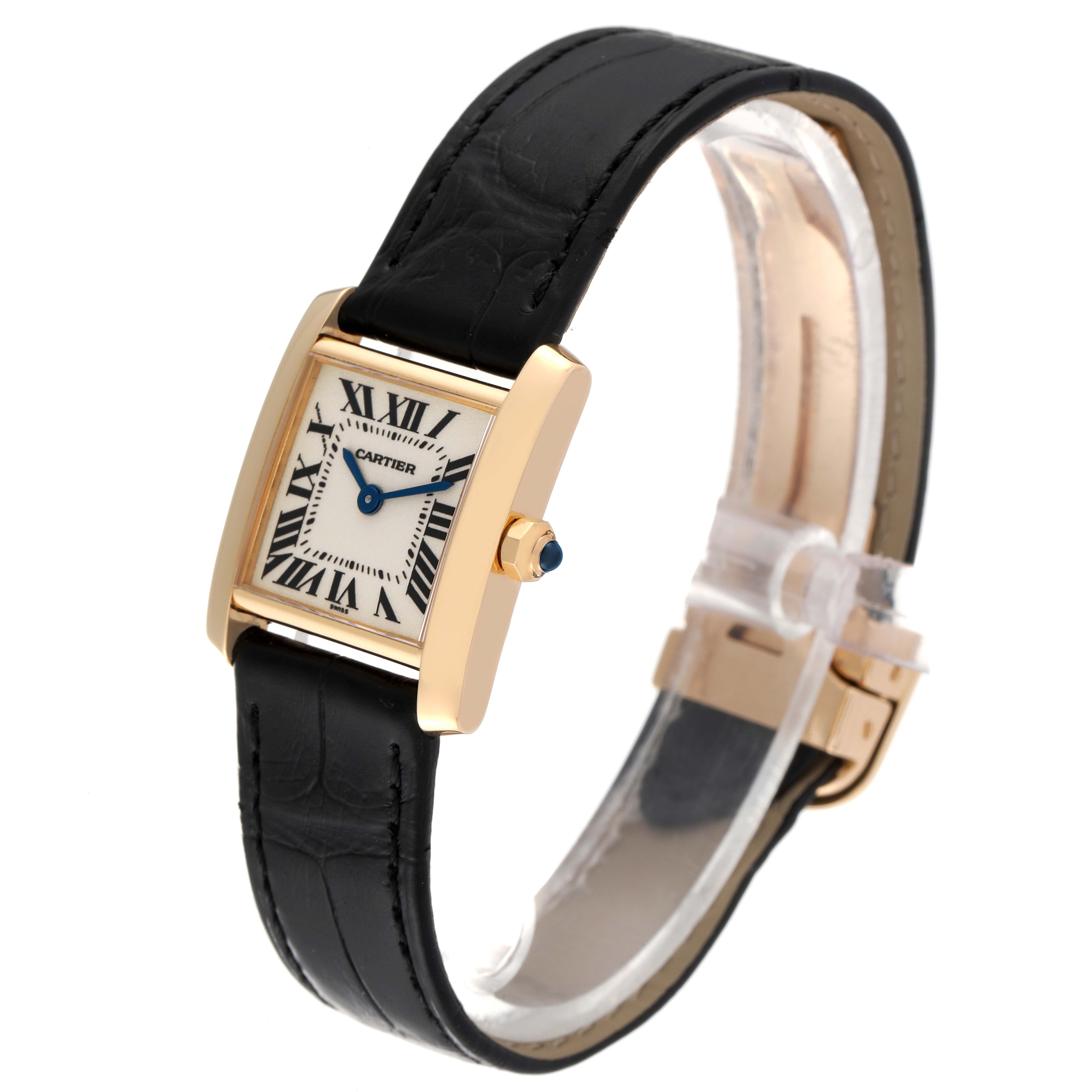 This is a side angle view of the Cartier Tank Francaise W5000256 Women's Yellow Gold Silver Dial W5000256 Women's Yellow Gold Silver Dial watch, displaying the face, leather strap, and clasp.