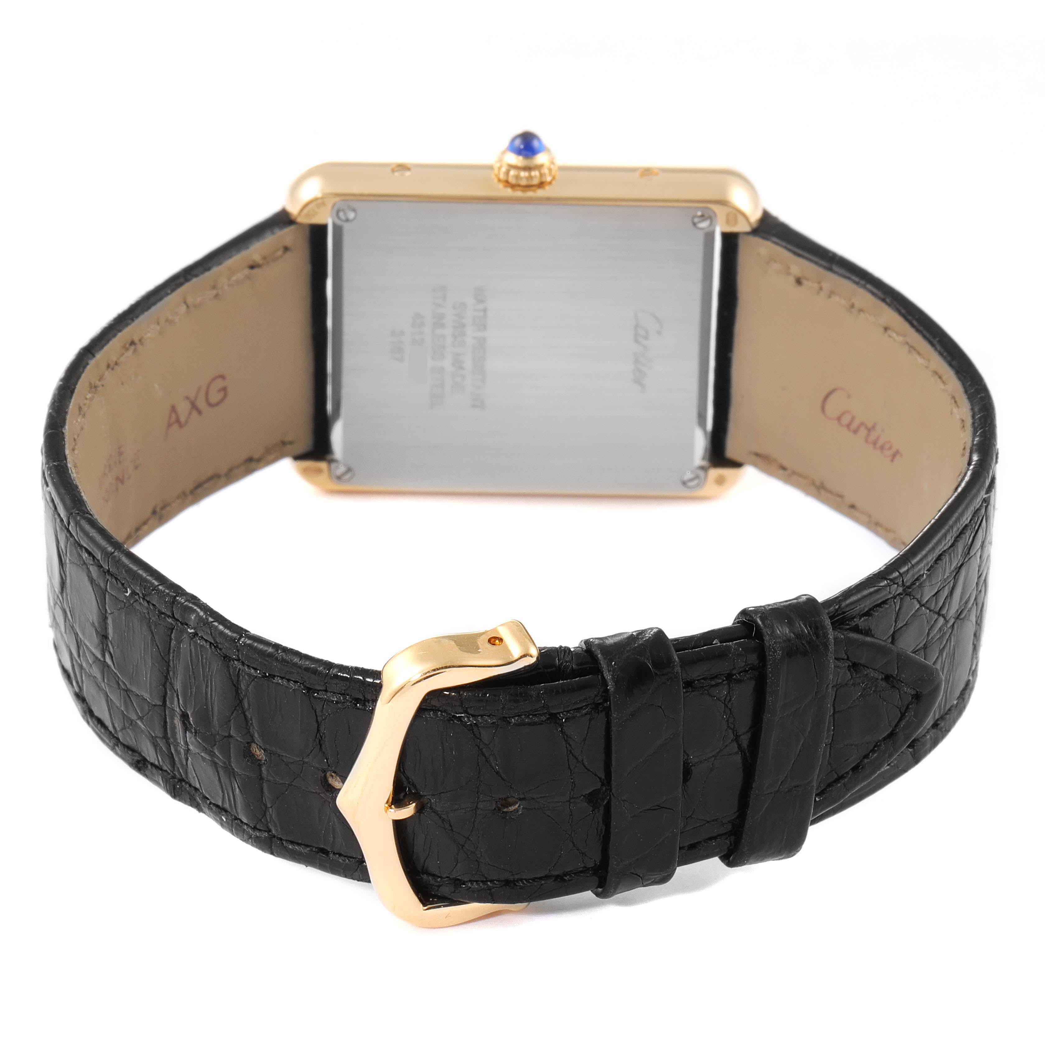 The image shows the back view of a Cartier Tank Solo W5200004 Men
s Yellow Gold Silver Dial W5200004 Men
s Yellow Gold Silver Dial watch, focusing on the case back, crown, and black leather strap with a gold buckle.