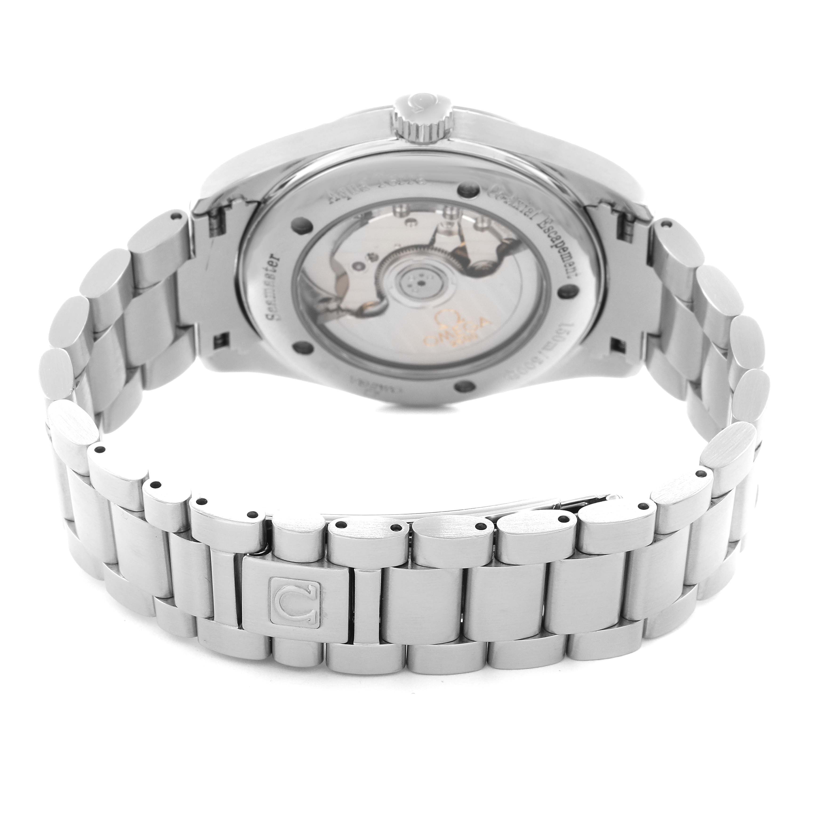 The image shows the back of the Omega Aqua Terra 2503.33.00 Men's Stainless Steel Silver Dial watch, highlighting its transparent case back and stainless steel bracelet.