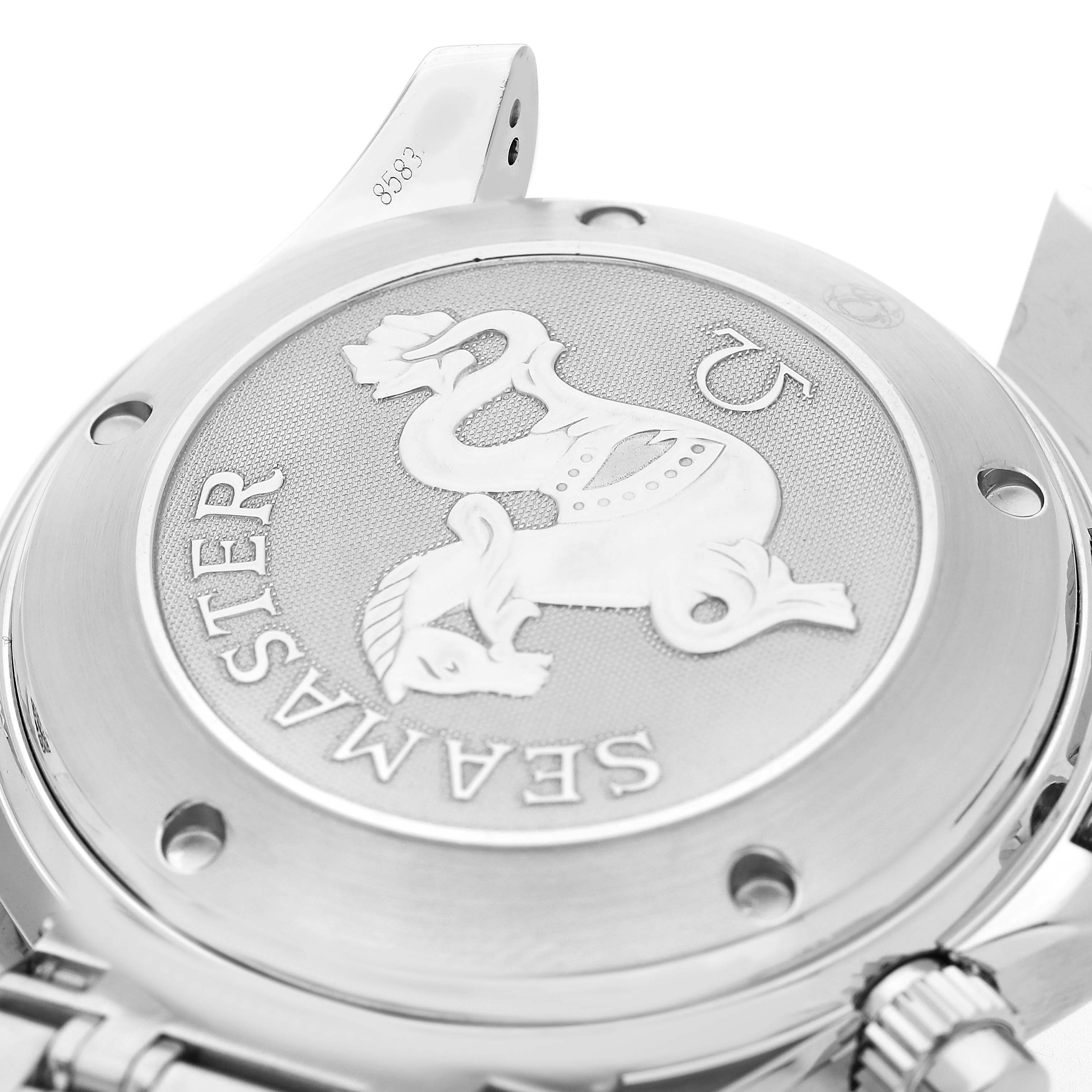 The image shows the case back of an Omega Seamaster 213.30.42.40.01.001 Men's Stainless Steel Black Dial watch, highlighting its engraved logo and screws.