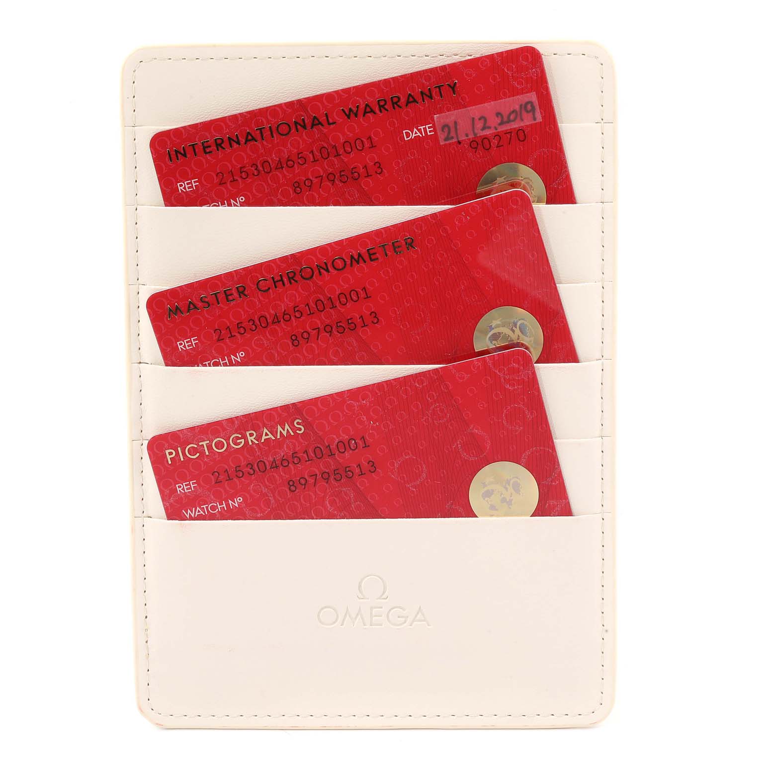 The image shows the warranty cards for an Omega Planet Ocean 215.30.46.51.01.001 Men
s Stainless Steel Black Dial 215.30.46.51.01.001 Men
s Stainless Steel Black Dial watch, displayed in a white holder.