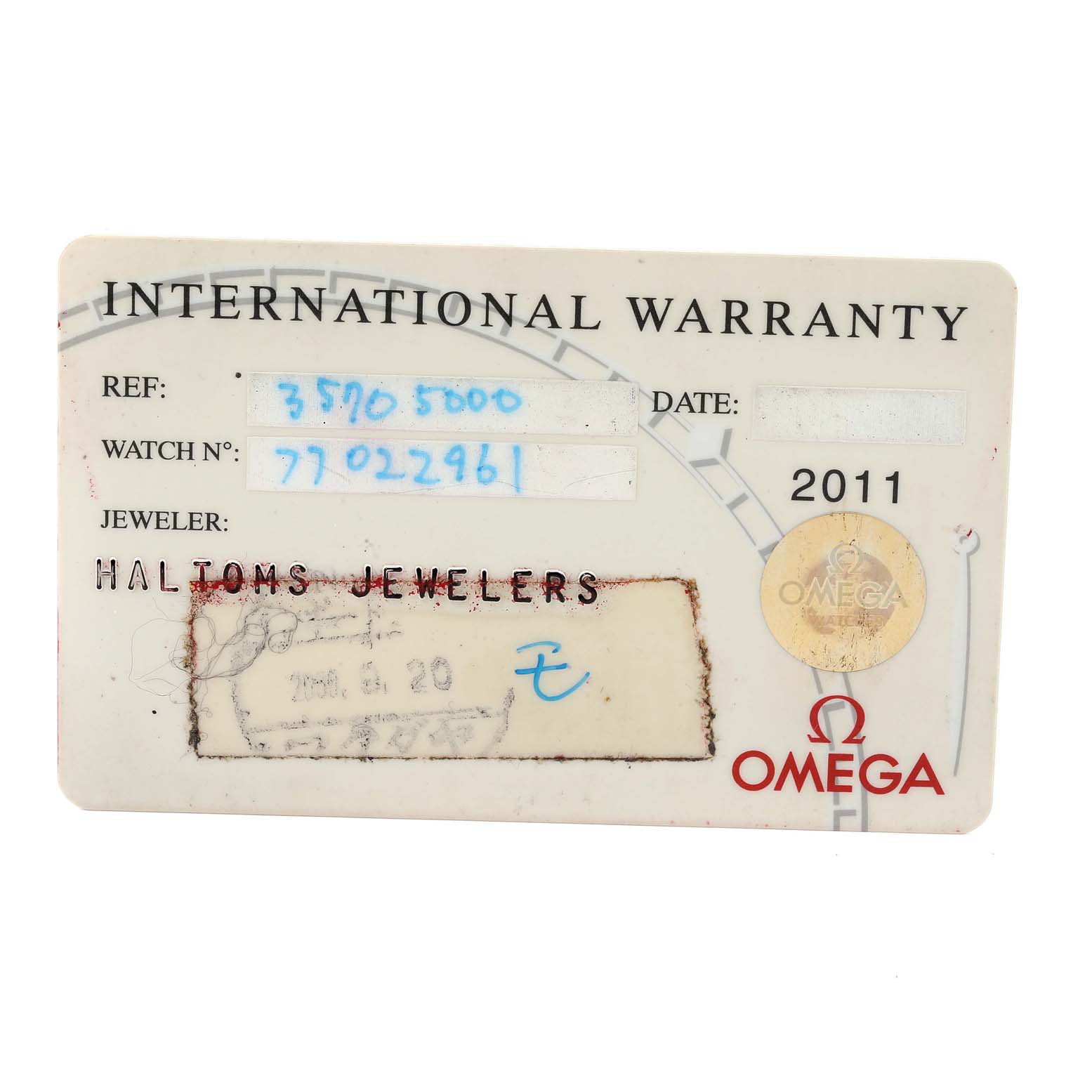 This image shows the international warranty card for an Omega Speedmaster 3570.50.00 Men
s Stainless Steel Black Dial 3570.50.00 Men
s Stainless Steel Black Dial watch, detailing reference and watch number, jeweler, and date.
