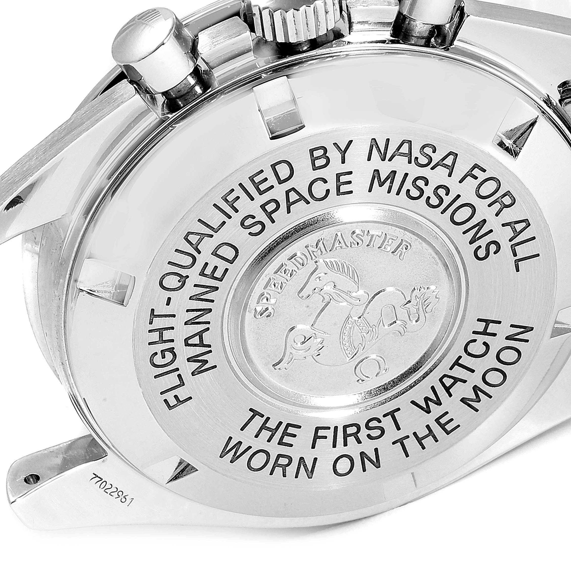 The image shows the case back and part of the crown area of an Omega Speedmaster 3570.50.00 Men
s Stainless Steel Black Dial 3570.50.00 Men
s Stainless Steel Black Dial watch, highlighting its NASA space mission inscription.