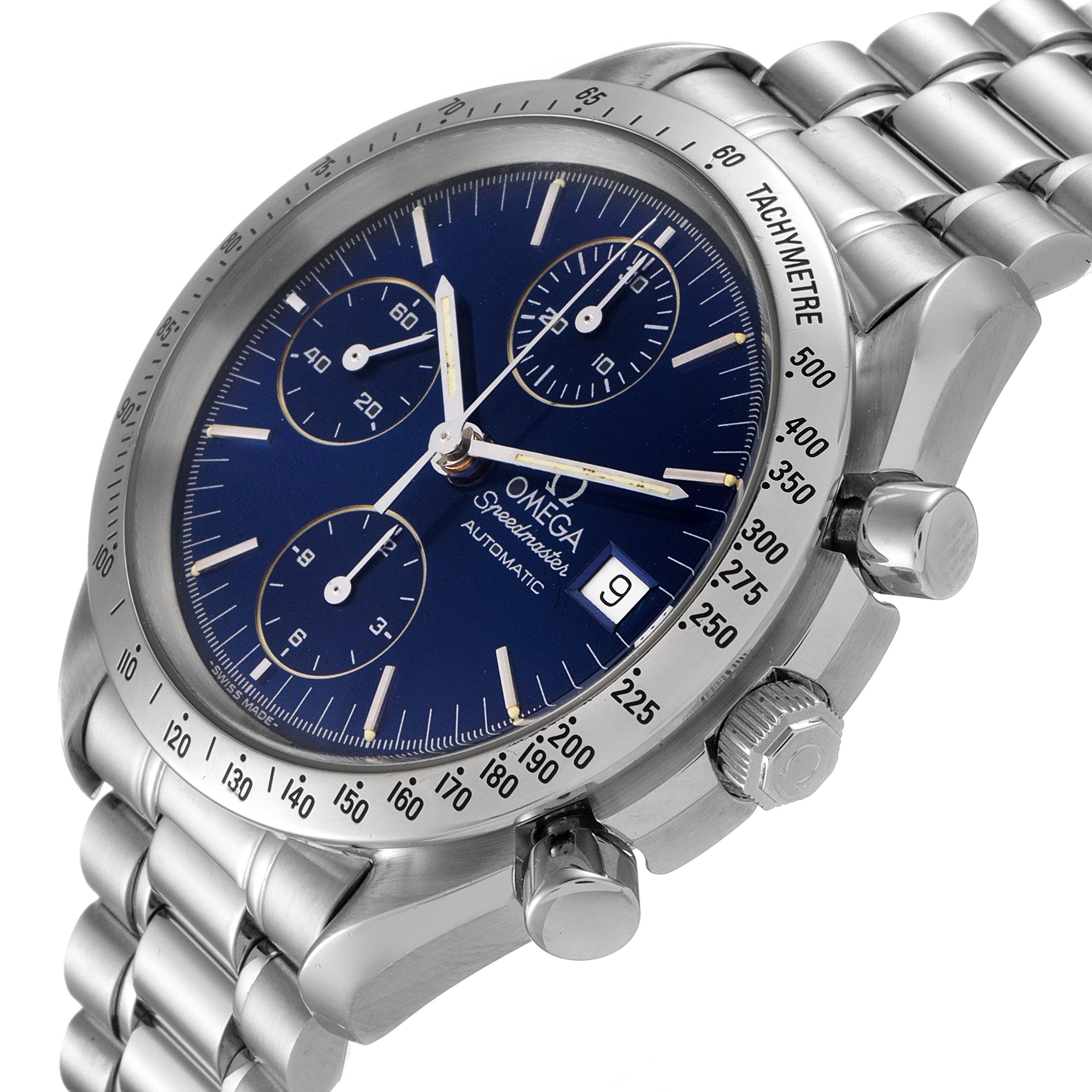 This close-up angle of the Omega Speedmaster 3511.80.00 Men's Stainless Steel Blue Dial 3511.80.00 Men's Stainless Steel Blue Dial watch shows the face, tachymeter bezel, date window, and part of the stainless steel bracelet.